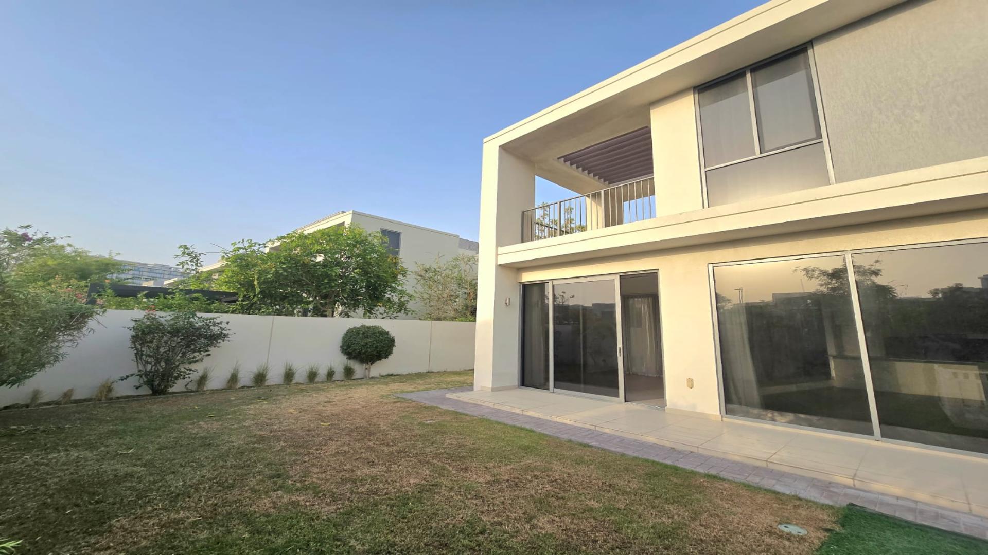 Villa exterior with garden in Sidra Villas, Dubai Hills Estate. Perfect family home for sale