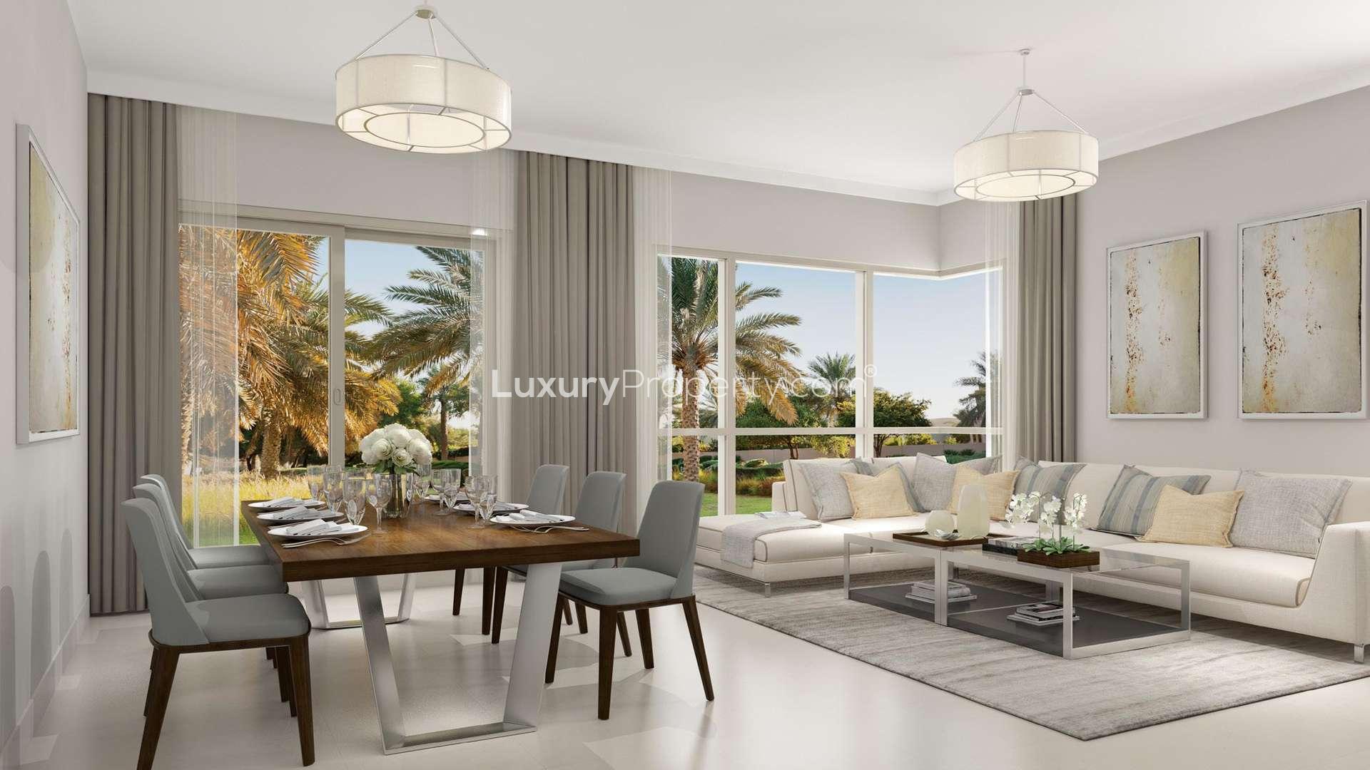 Contemporary living and dining area in Maple Villa, Dubai Hills Estate, with garden views
