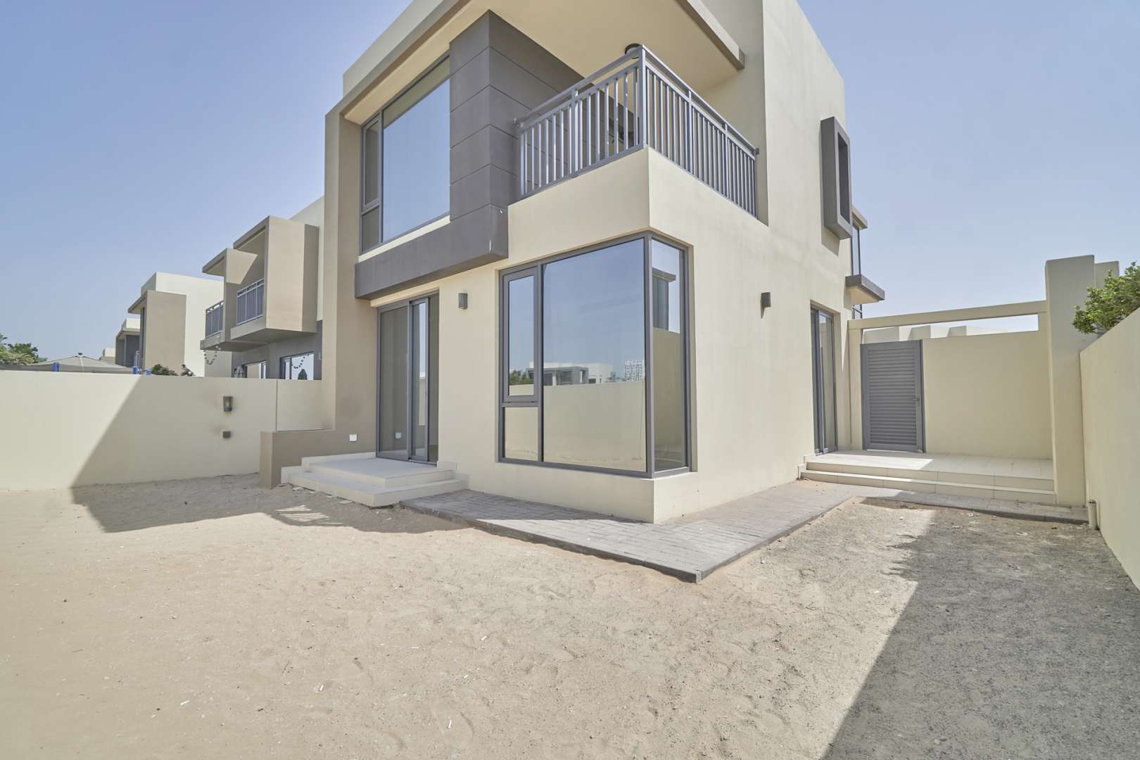 4-bedroom townhouse exterior in Maple, Dubai Hills Estate, featuring modern architecture and driveway