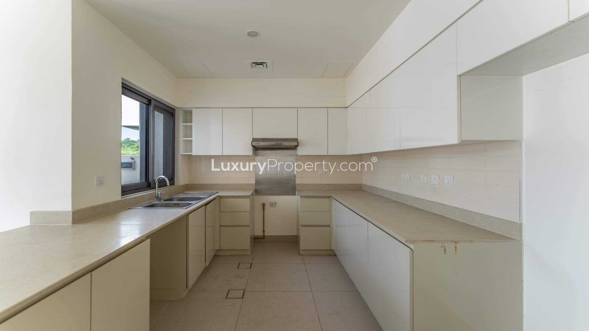 Open-plan kitchen and living area in 4-bedroom villa, Maple 3, Dubai Hills Estate