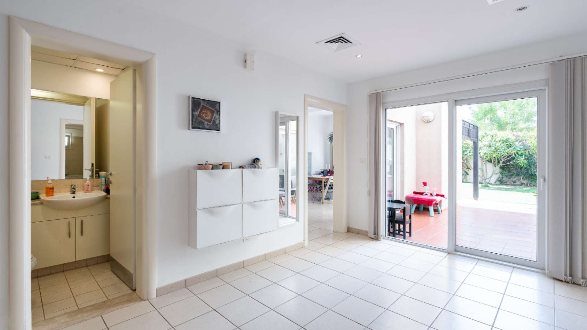Beautiful 4-bedroom villa exterior with lush garden in Meadows 5, Dubai for sale
