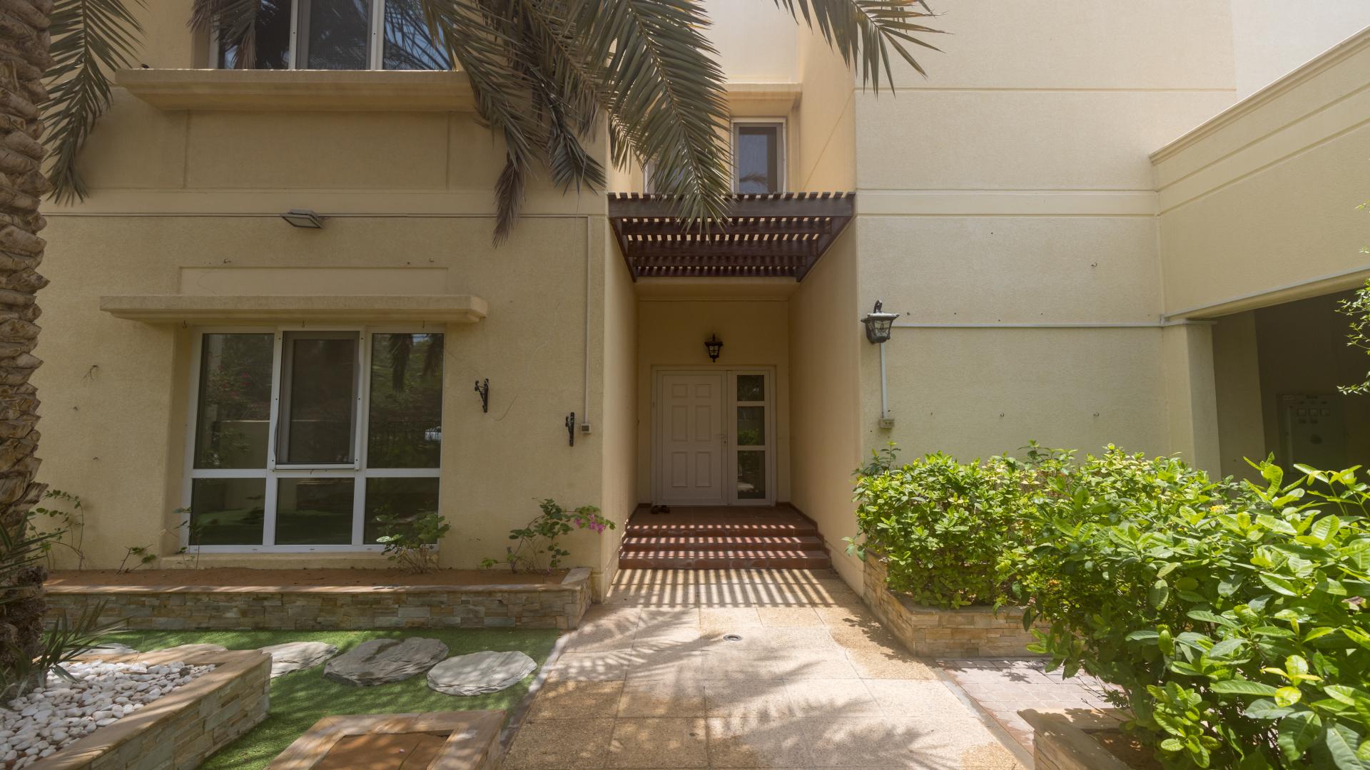 Upgraded villa in Meadows 9, quiet location, featuring lush greenery and spacious driveway