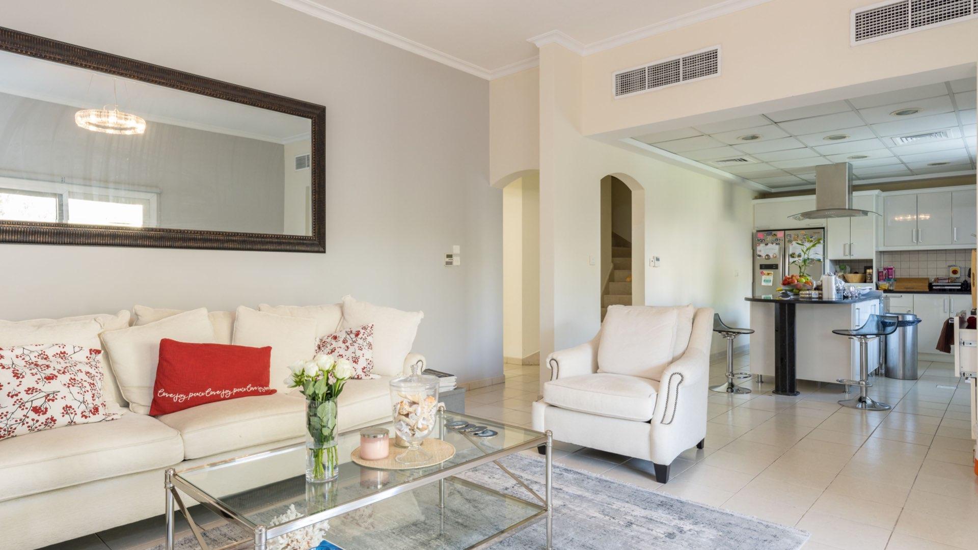 Living room and kitchen in Meadows 1 villa for sale, four bedrooms, five bathrooms