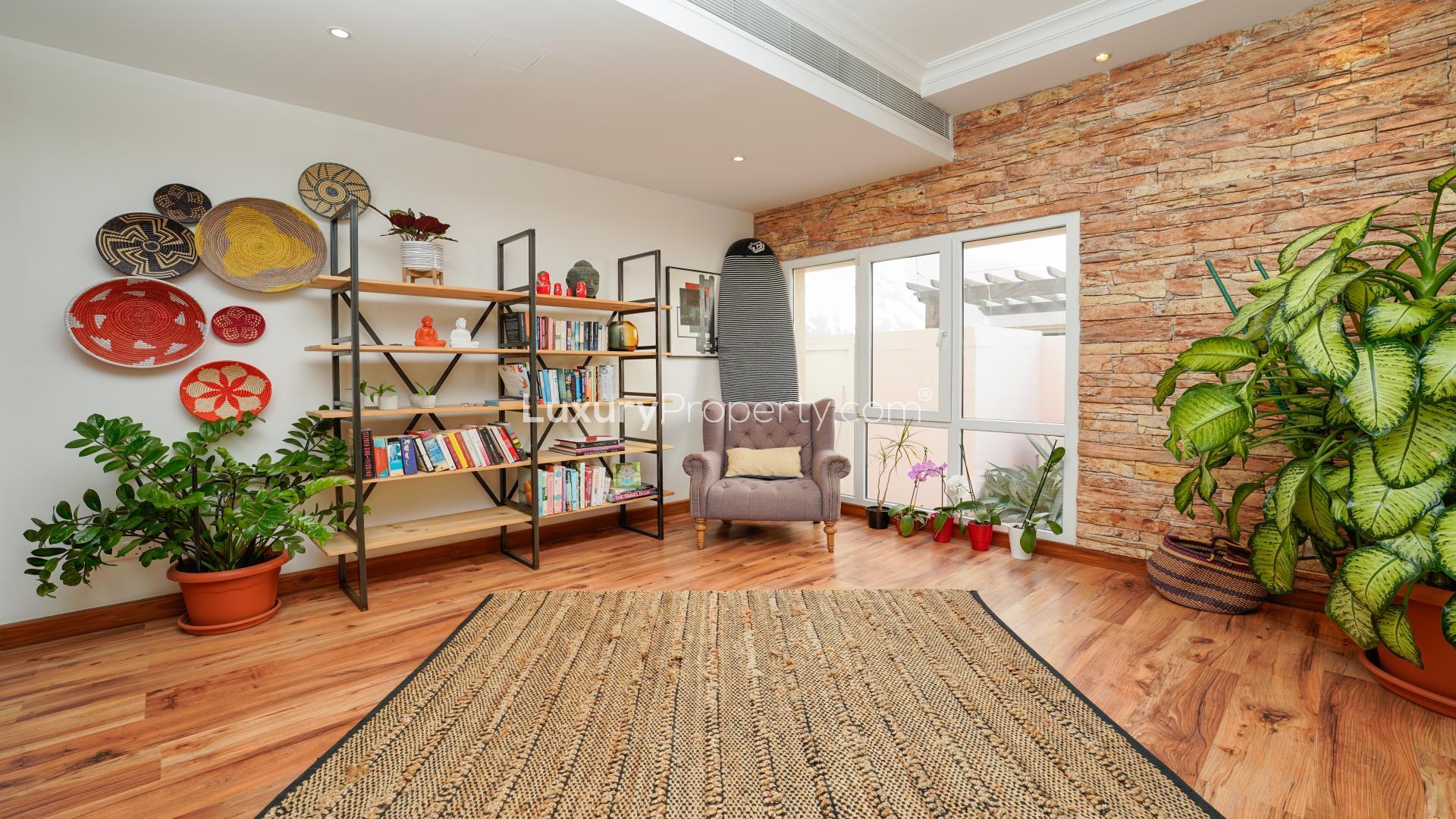 Fully upgraded living room in Meadows villa, featuring stylish decor and natural light