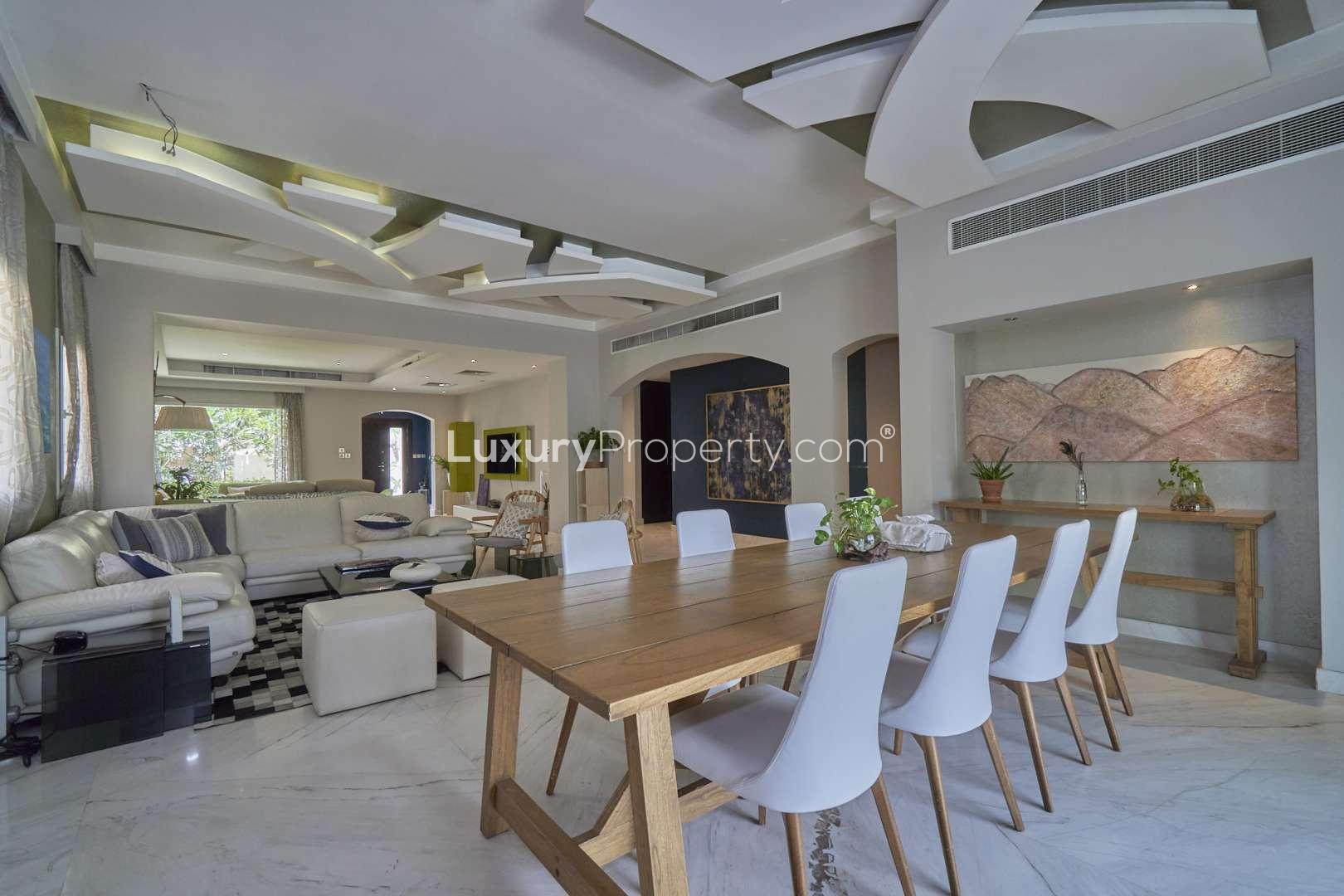 Modern living room in fully upgraded 4-bedroom Meadows 4 villa, featuring elegant decor