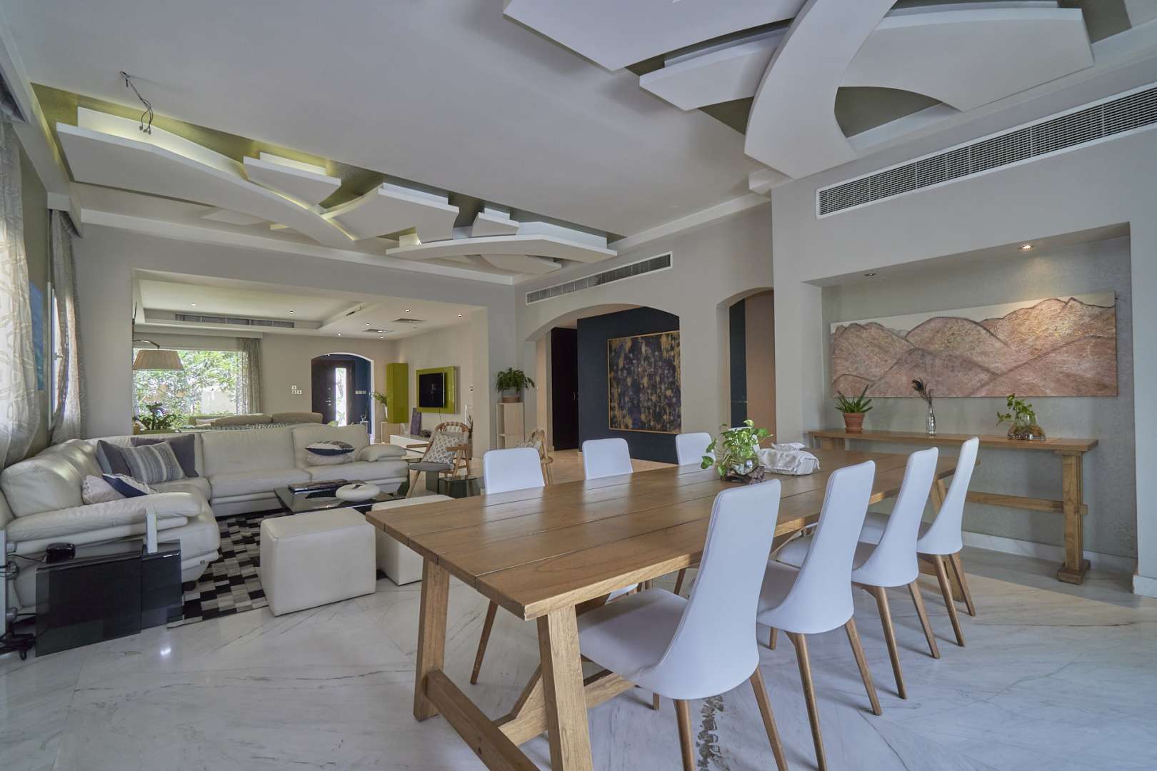 Modern living room in fully upgraded 4-bedroom Meadows 4 villa, featuring elegant decor