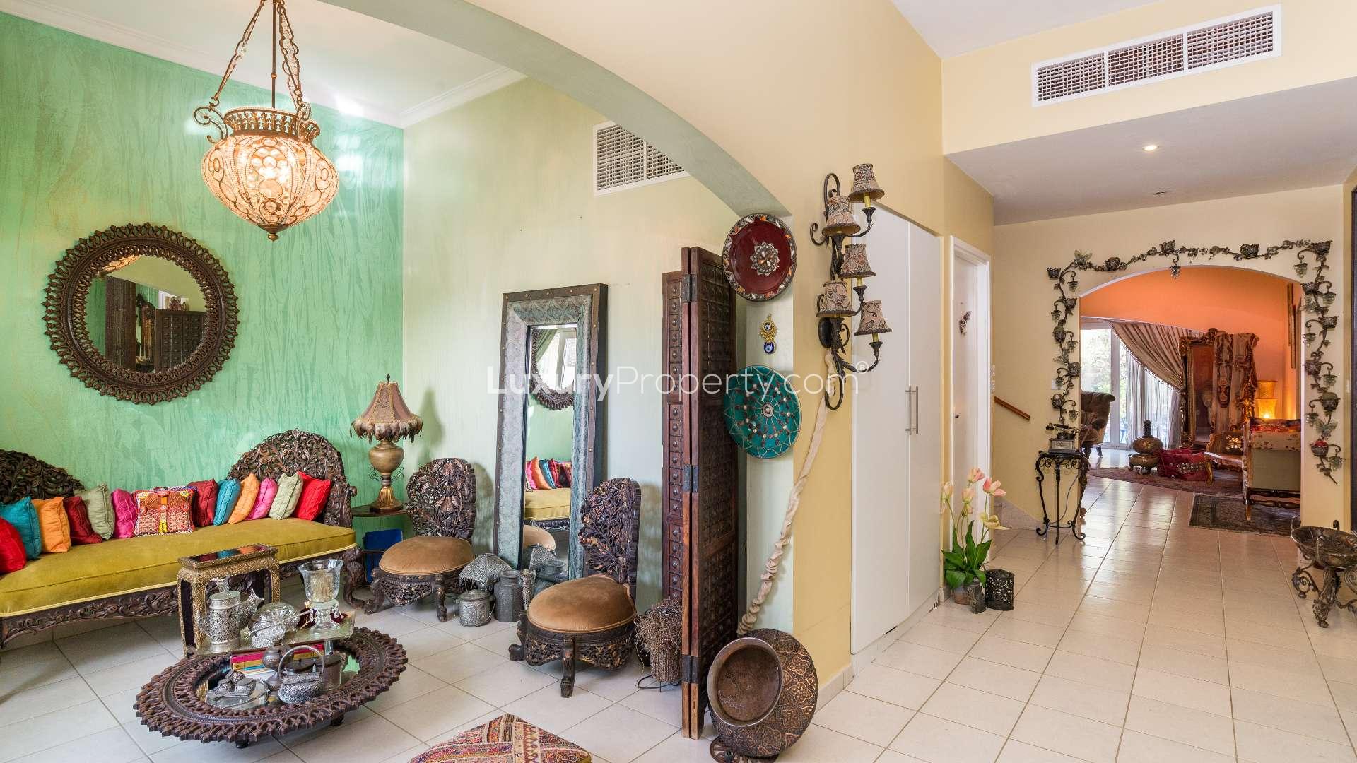 Luxurious villa with private pool in Meadows 9, Dubai, surrounded by lush greenery