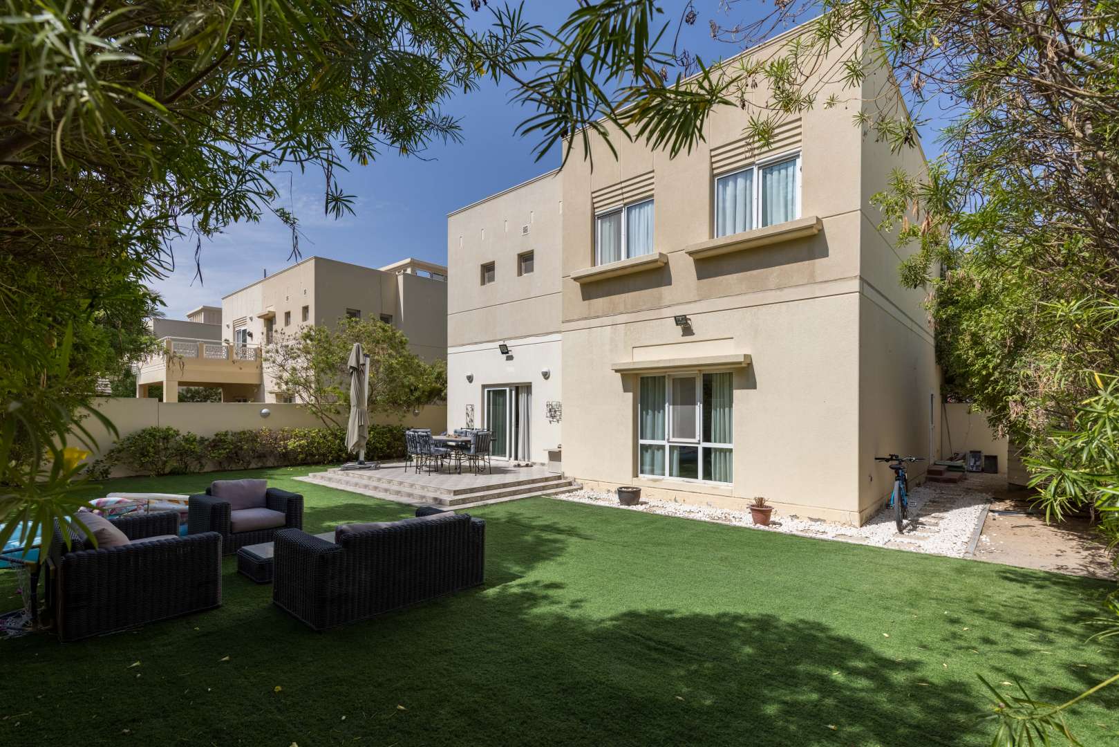 Spacious hallway in Meadows 9 villa, featuring modern decor and natural lighting