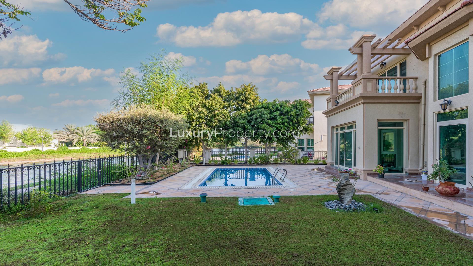 Lake facing Spanish style villa with pool in Jumeirah Islands, European Clusters