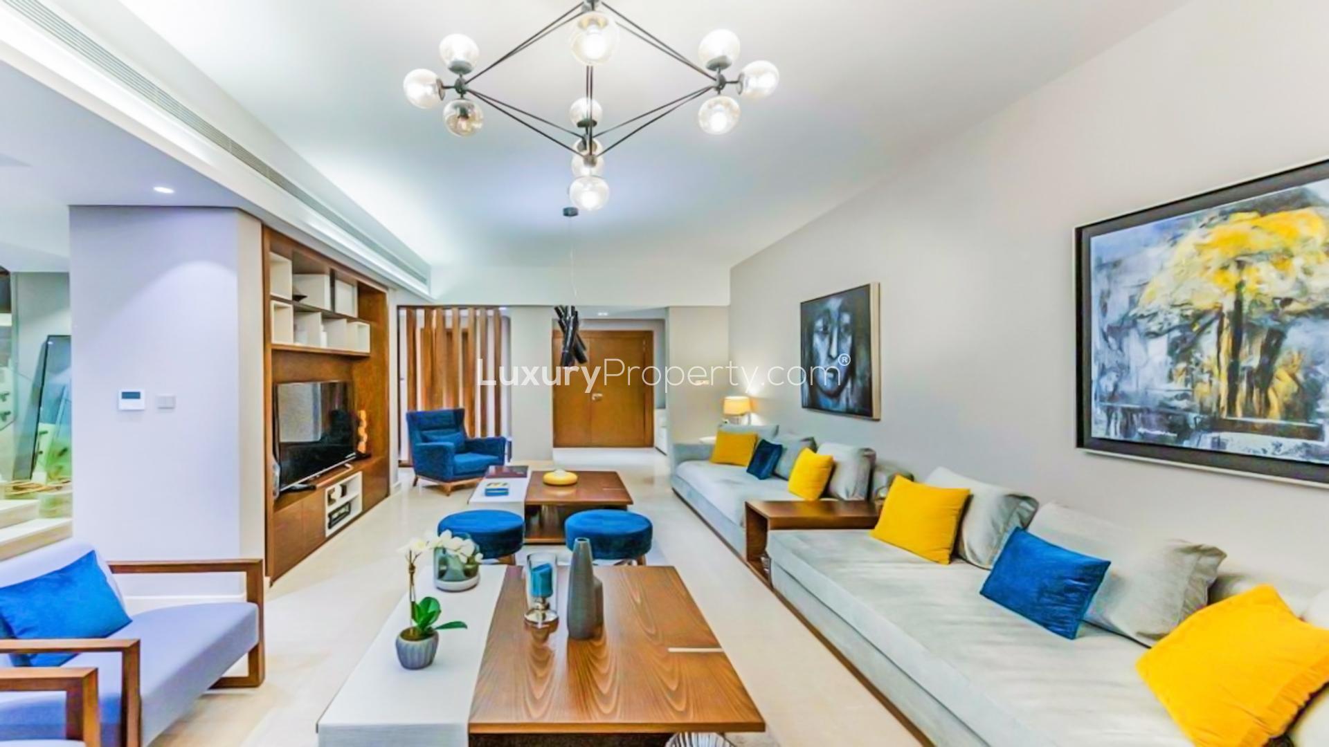 Luxurious living room in upgraded Meydan townhouse, modern decor, bright ambiance