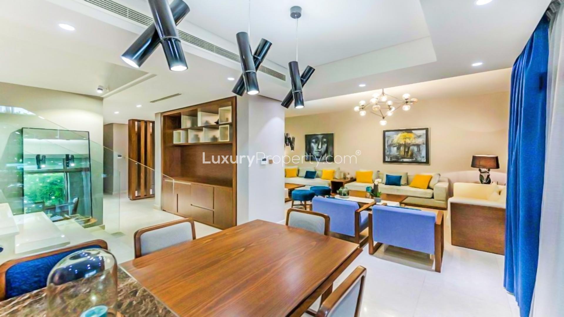 Luxurious living room in upgraded Meydan townhouse with modern decor and vibrant accents
