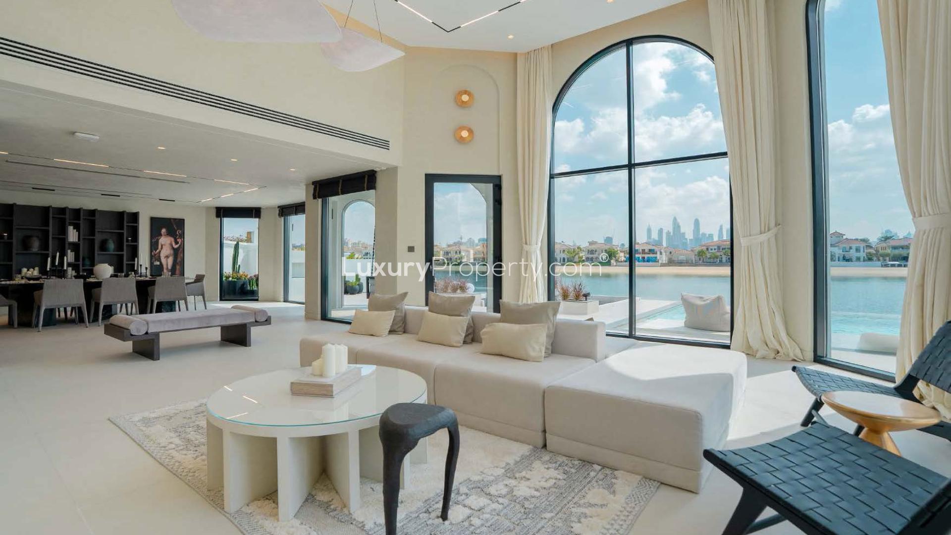 Luxurious Palm Jumeirah villa living room with waterfront views and modern decor