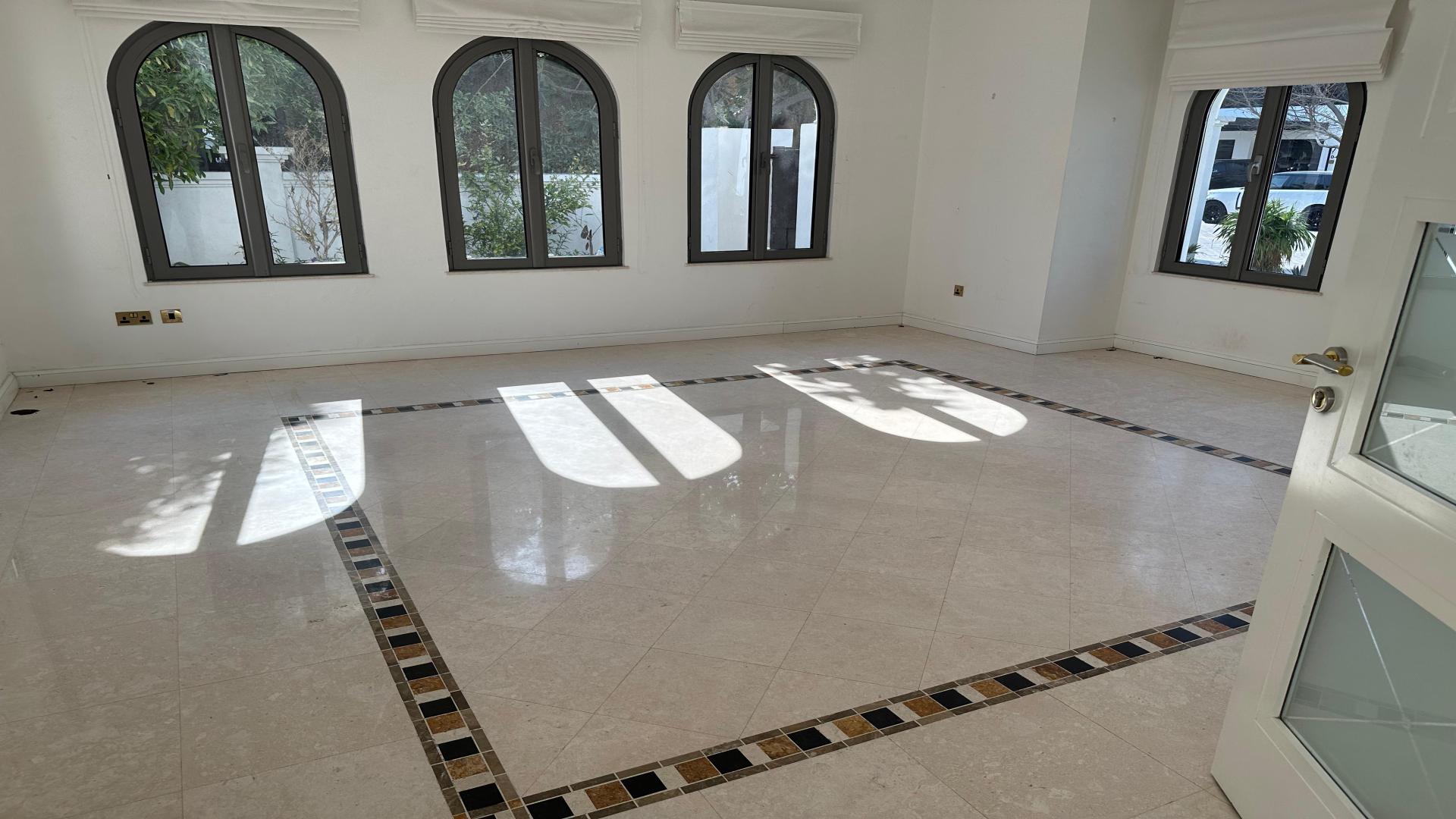 Beachfront view from Garden Homes Villa, Palm Jumeirah, with private pool and serene waters