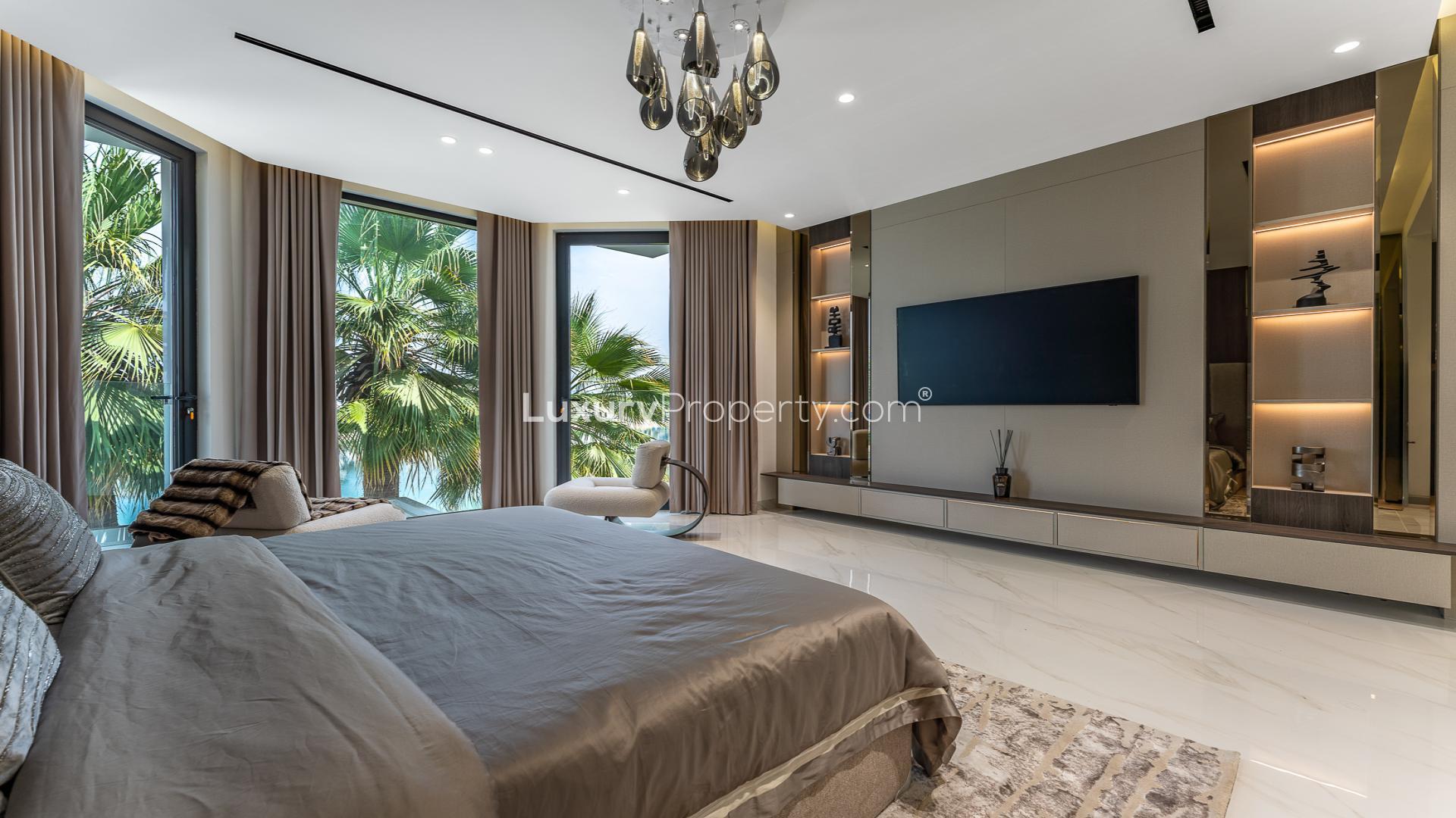 Luxurious living room in Palm Jumeirah villa with sea view, modern decor, and large windows