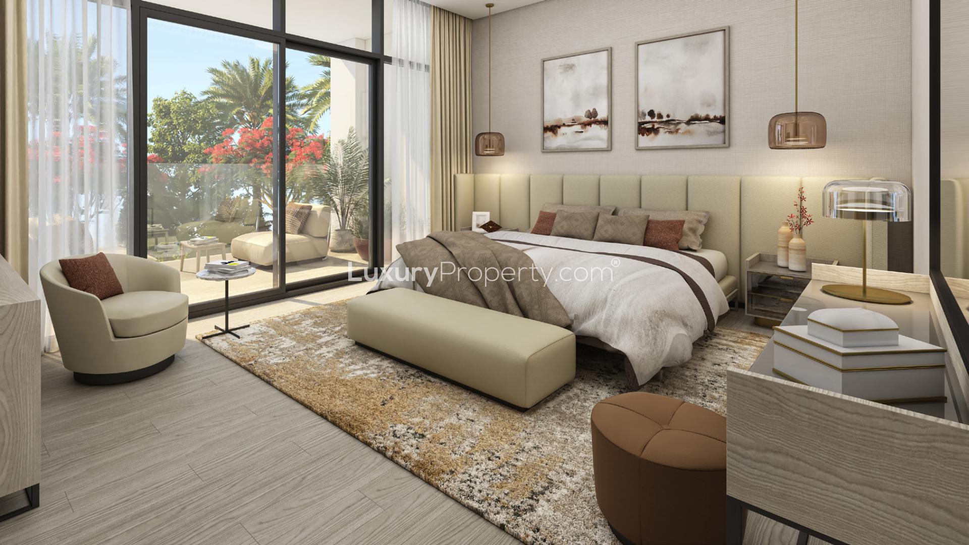 Contemporary living room in Al Furjan villa, featuring modern decor and open dining area
