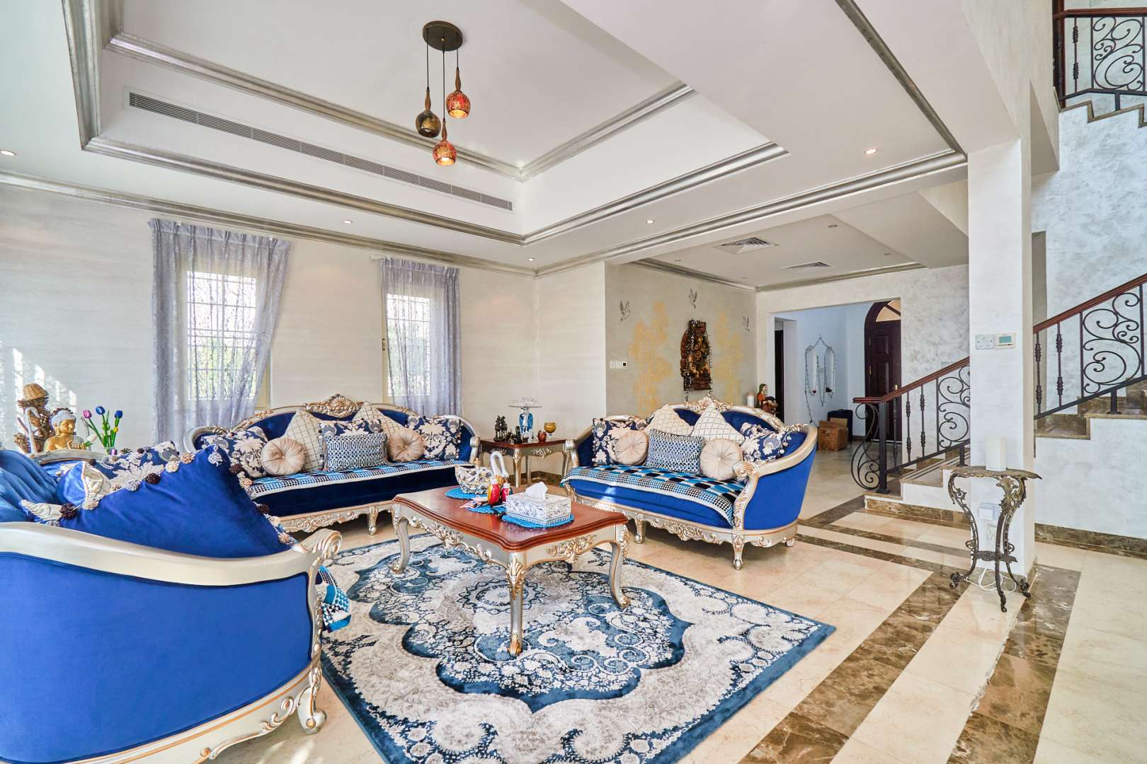 Lake view from villa in Jumeirah Islands Oasis Clusters, lush greenery and bright sky