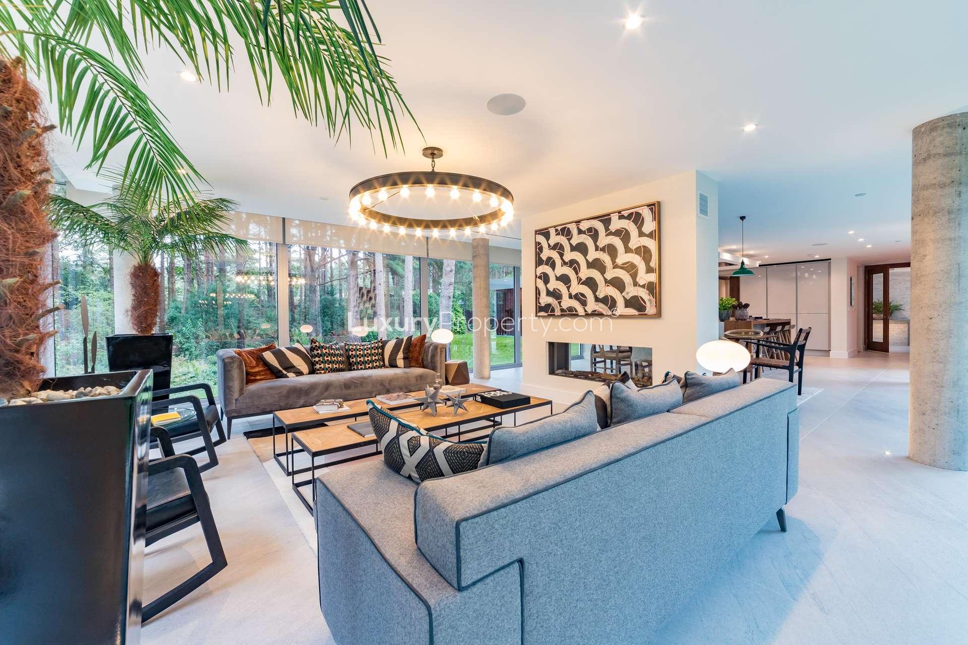 Modern living room in luxury villa, Canford Cliffs, featuring elegant decor and forest views