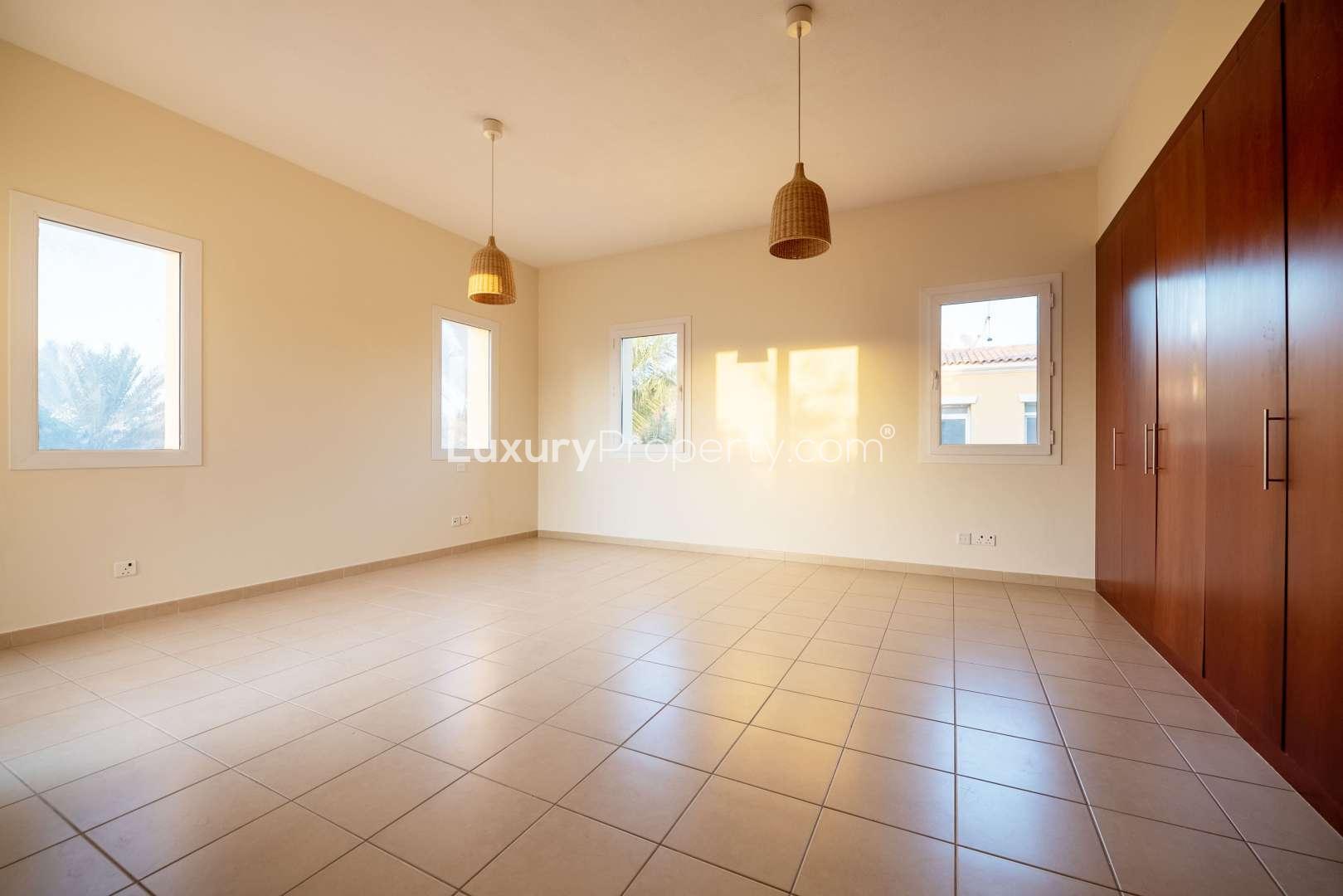 "Bright hallway in upgraded four-bedroom villa, Palmera, Arabian Ranches, for sale.",Spacious bedroom in upgraded four-bedroom villa, Palmera, Arabian Ranches for sale