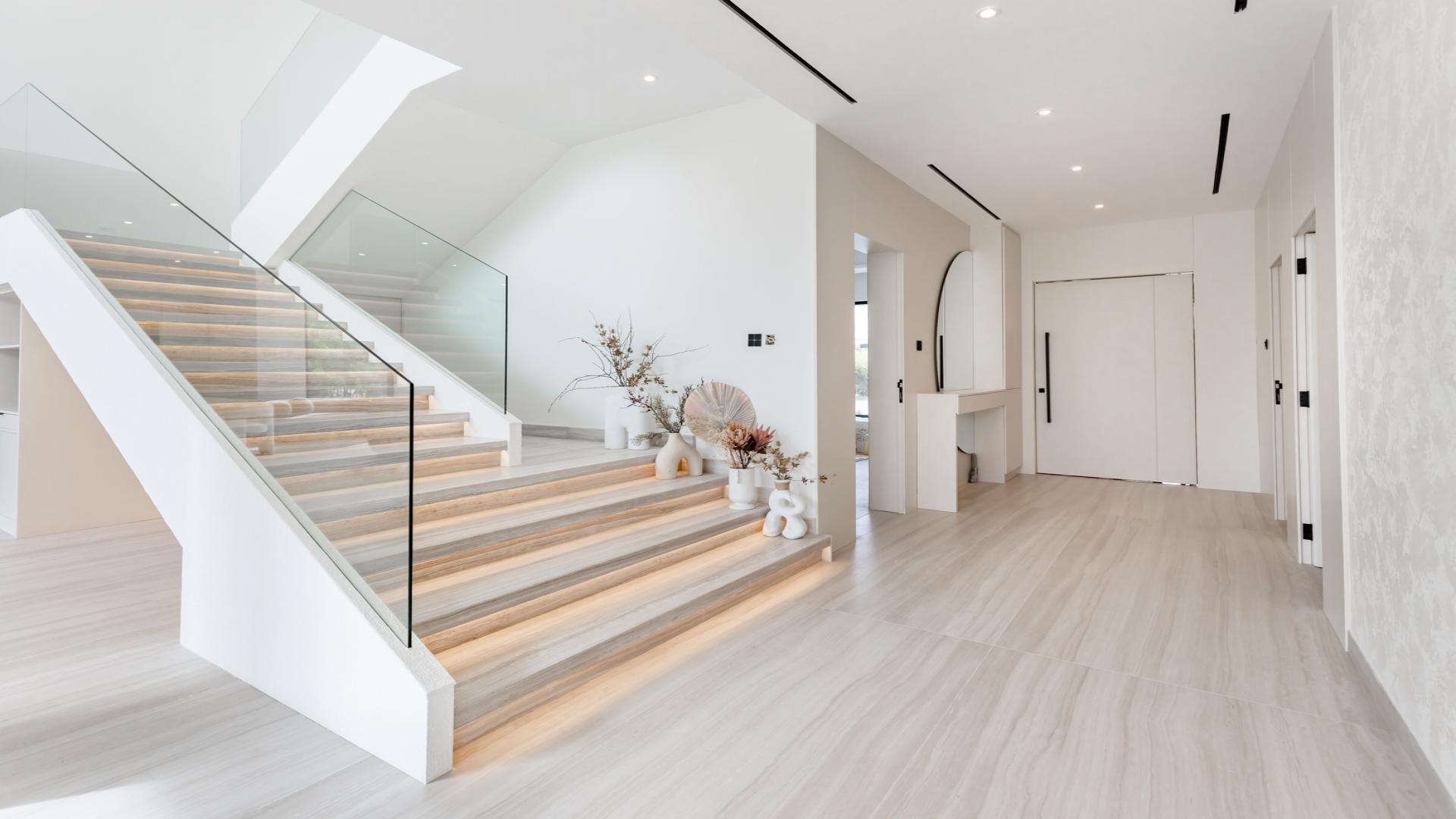 Modern interior of 5-bedroom villa in Jumeirah Islands, featuring spacious living area