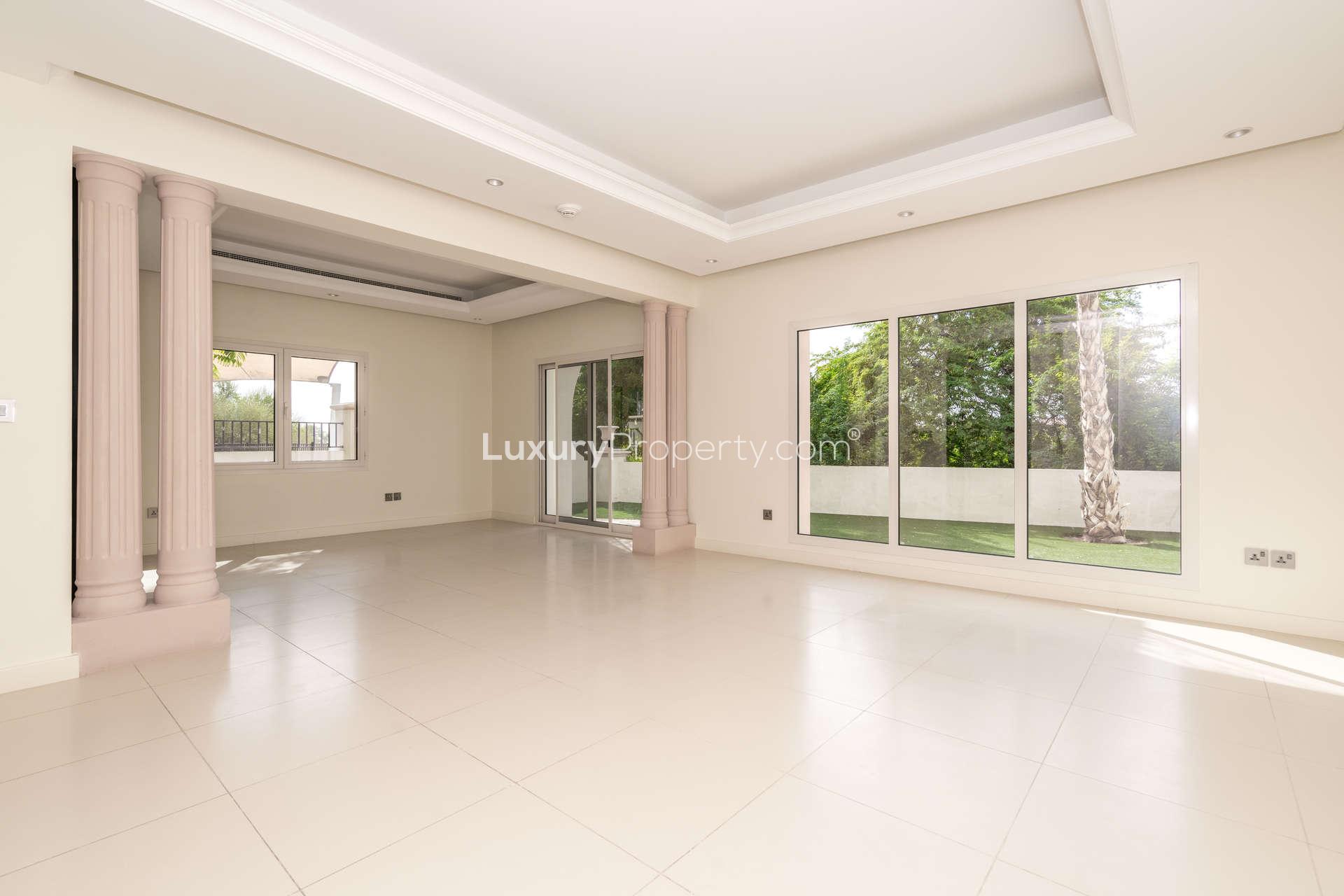 Modern Mediterranean townhouse exterior in Jumeirah Golf Estates, Fire community, for sale