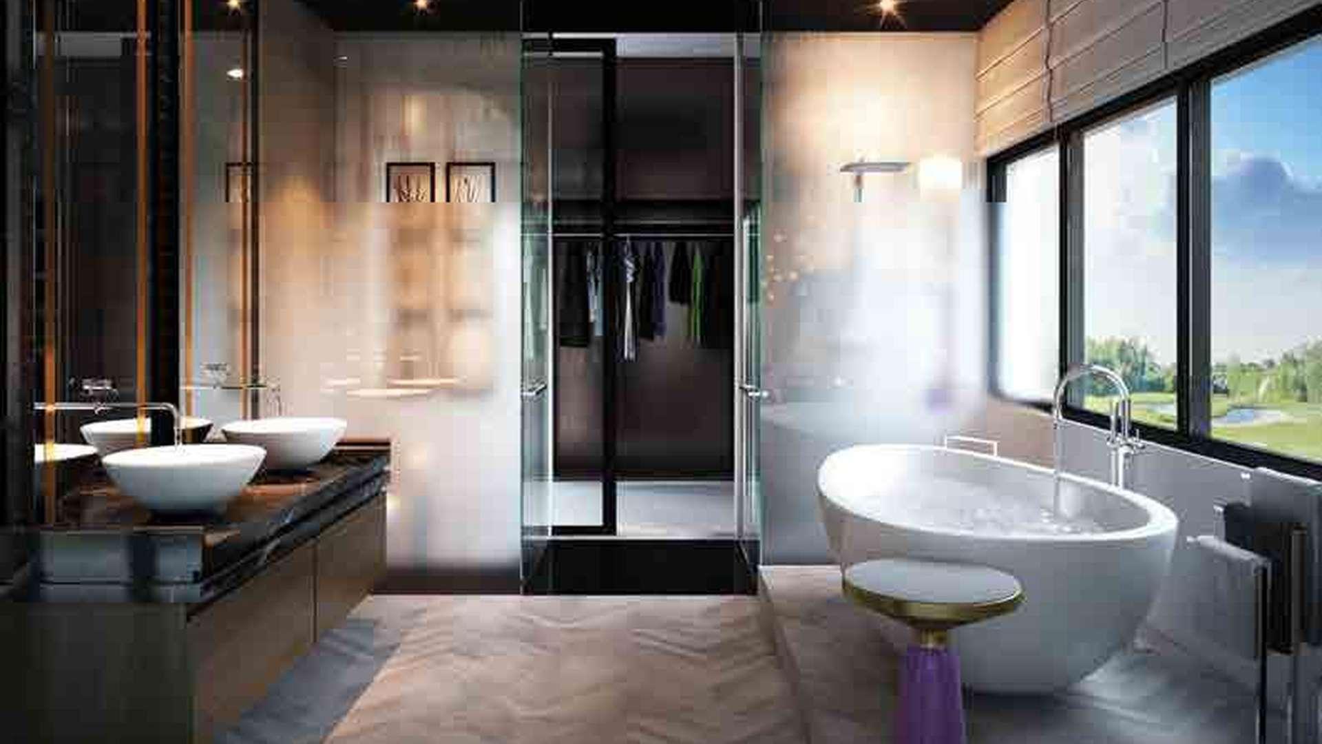 Luxurious living room in four-bedroom villa, Rockwood, Damac Hills, with large windows and decor