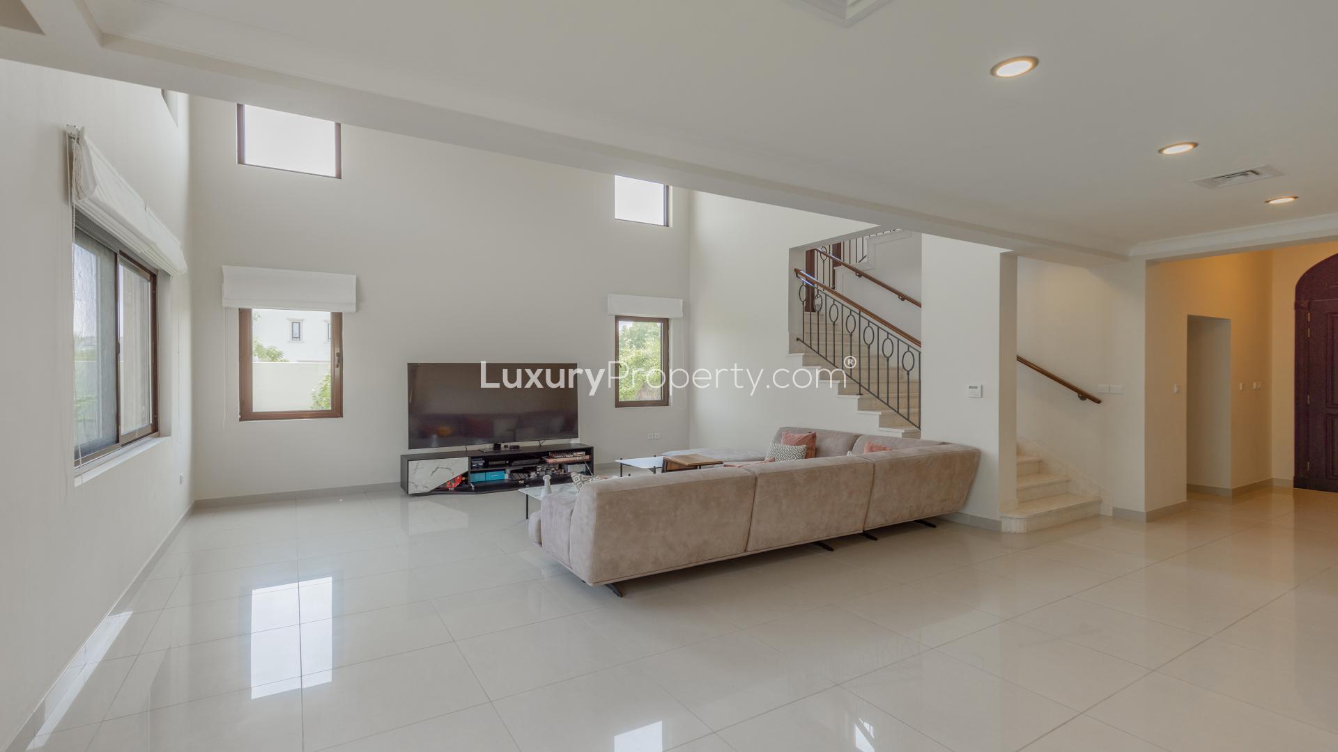 Modern living room in 4-bedroom villa, Rosa, Arabian Ranches 2, featuring cozy sectional sofa