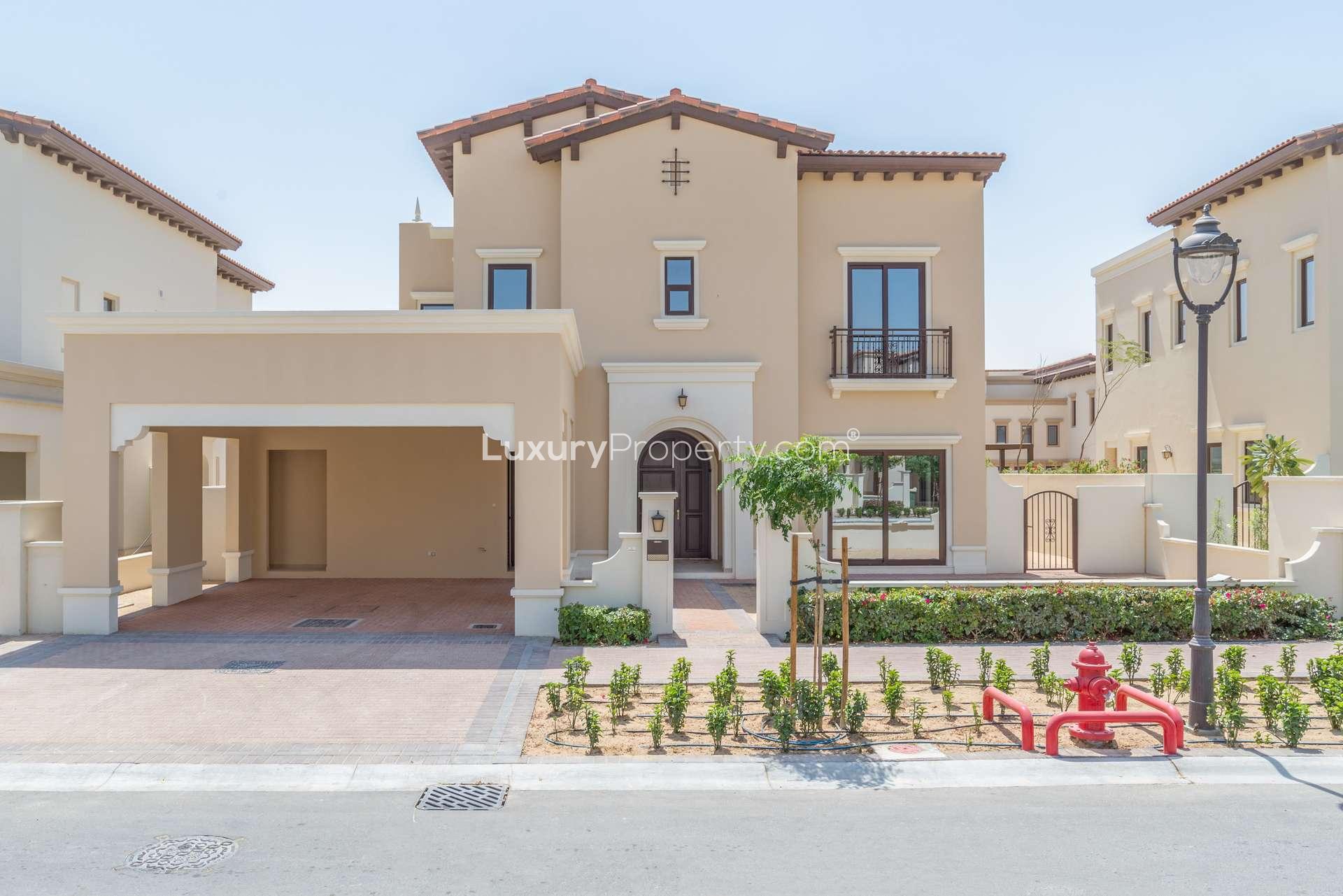 Luxurious poolside view at Rosa Arabian Ranches 2 villa community in Dubai