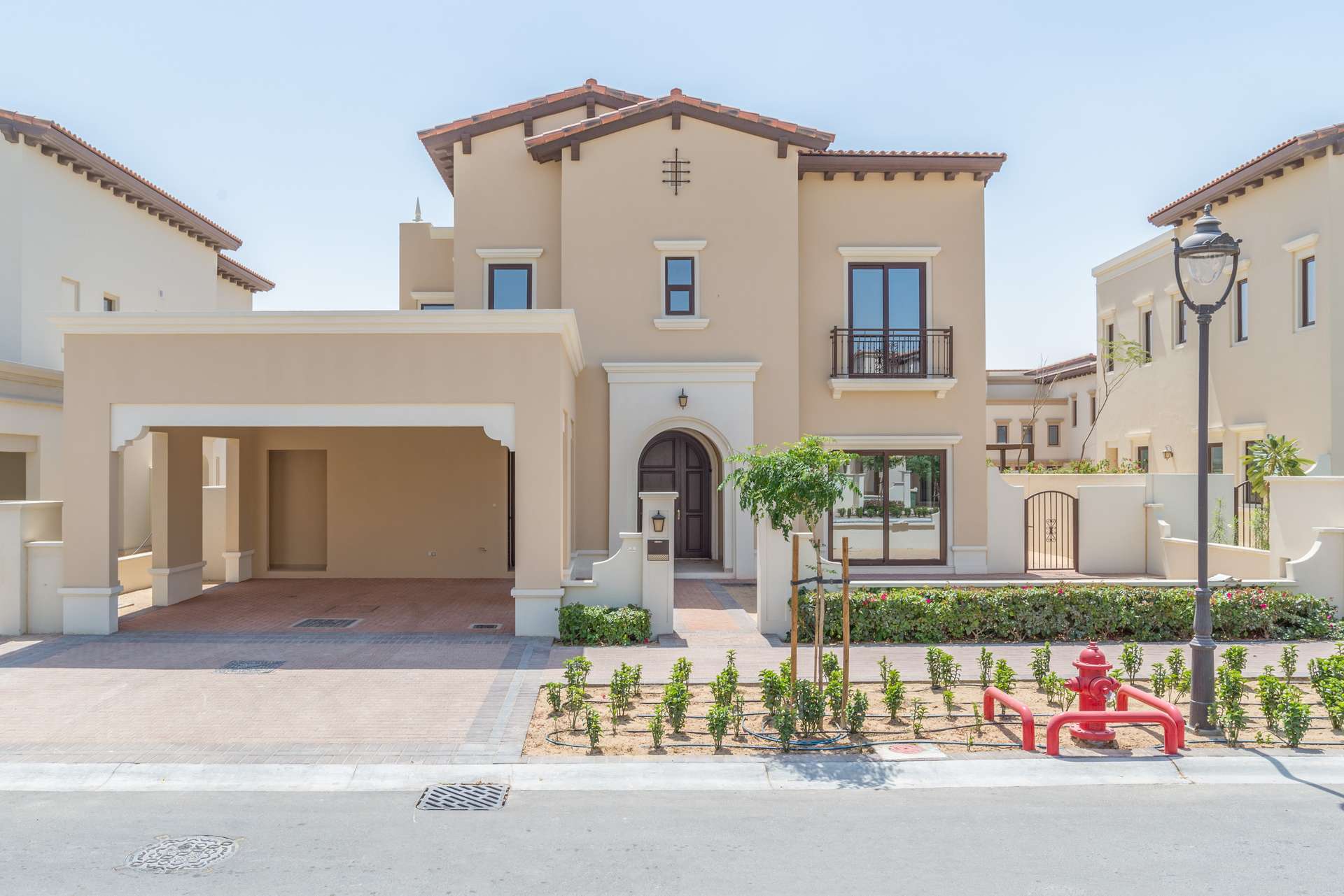 Luxurious poolside view at Rosa Arabian Ranches 2 villa community in Dubai