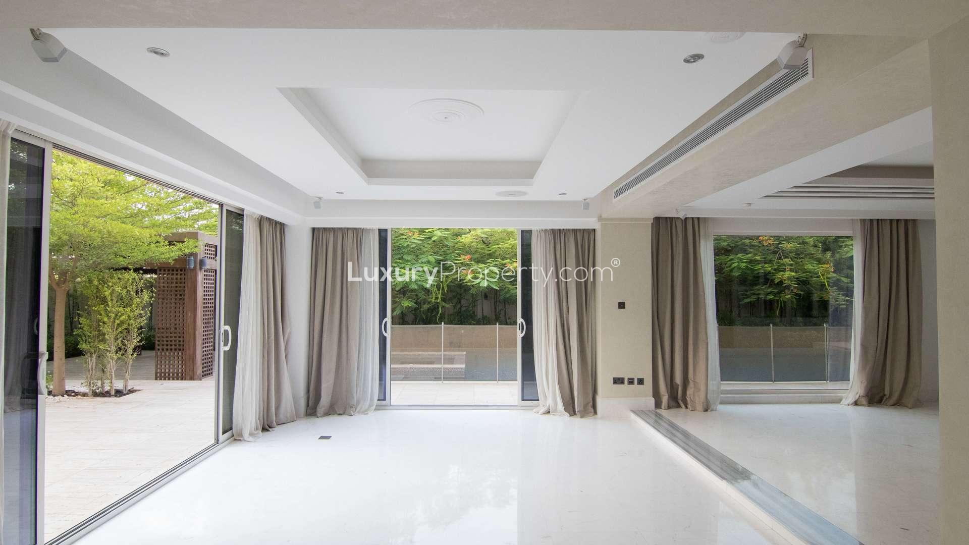 4 Bedroom Villa Exterior at Saadiyat Beach, Al Saadiyat Island, Abu Dhabi for Sale,Bright, spacious living room with large windows in Saadiyat Beach Villa, Abu Dhabi