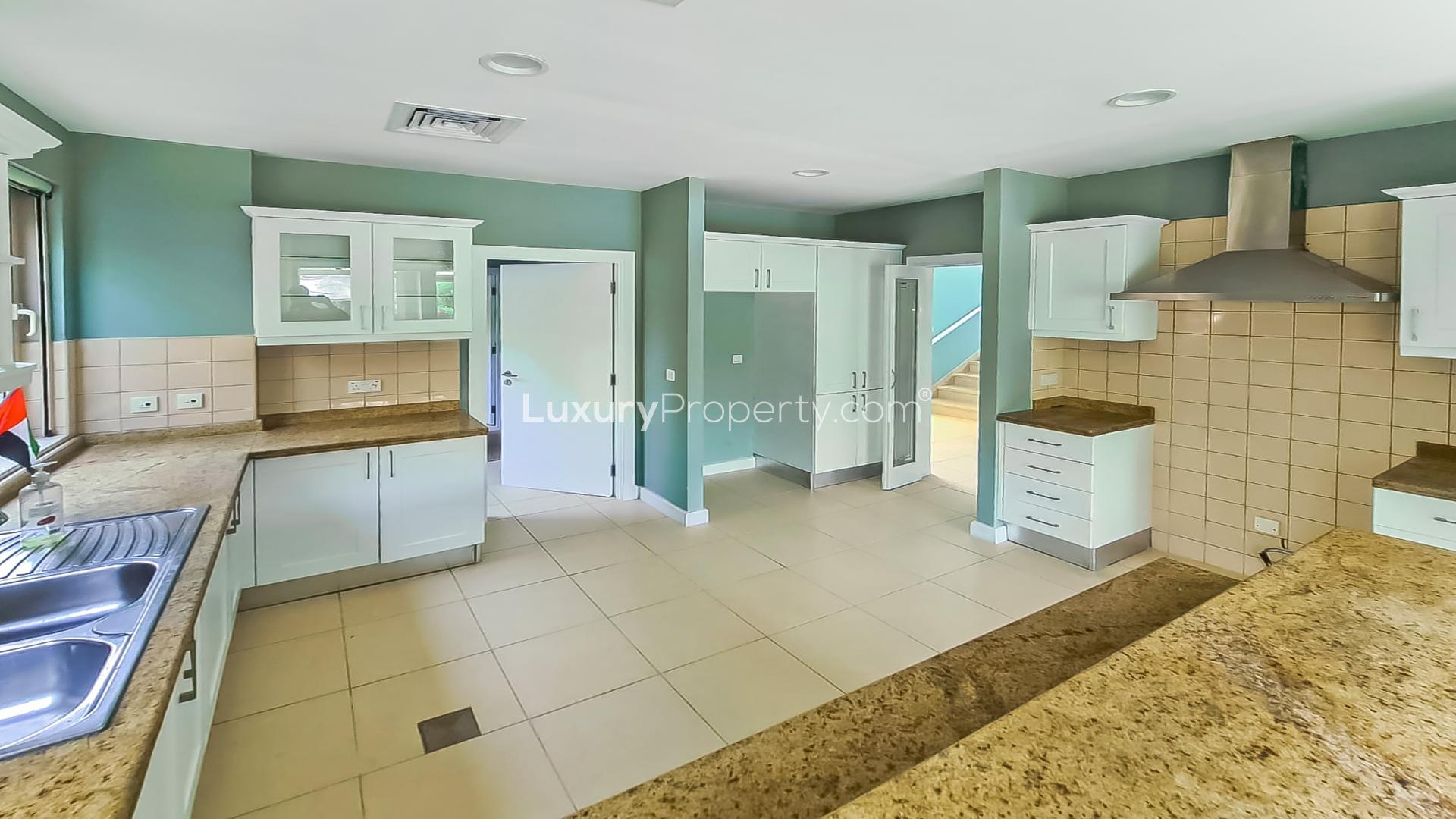 Bright living room with garden view in Saheel villa, Arabian Ranches for rent