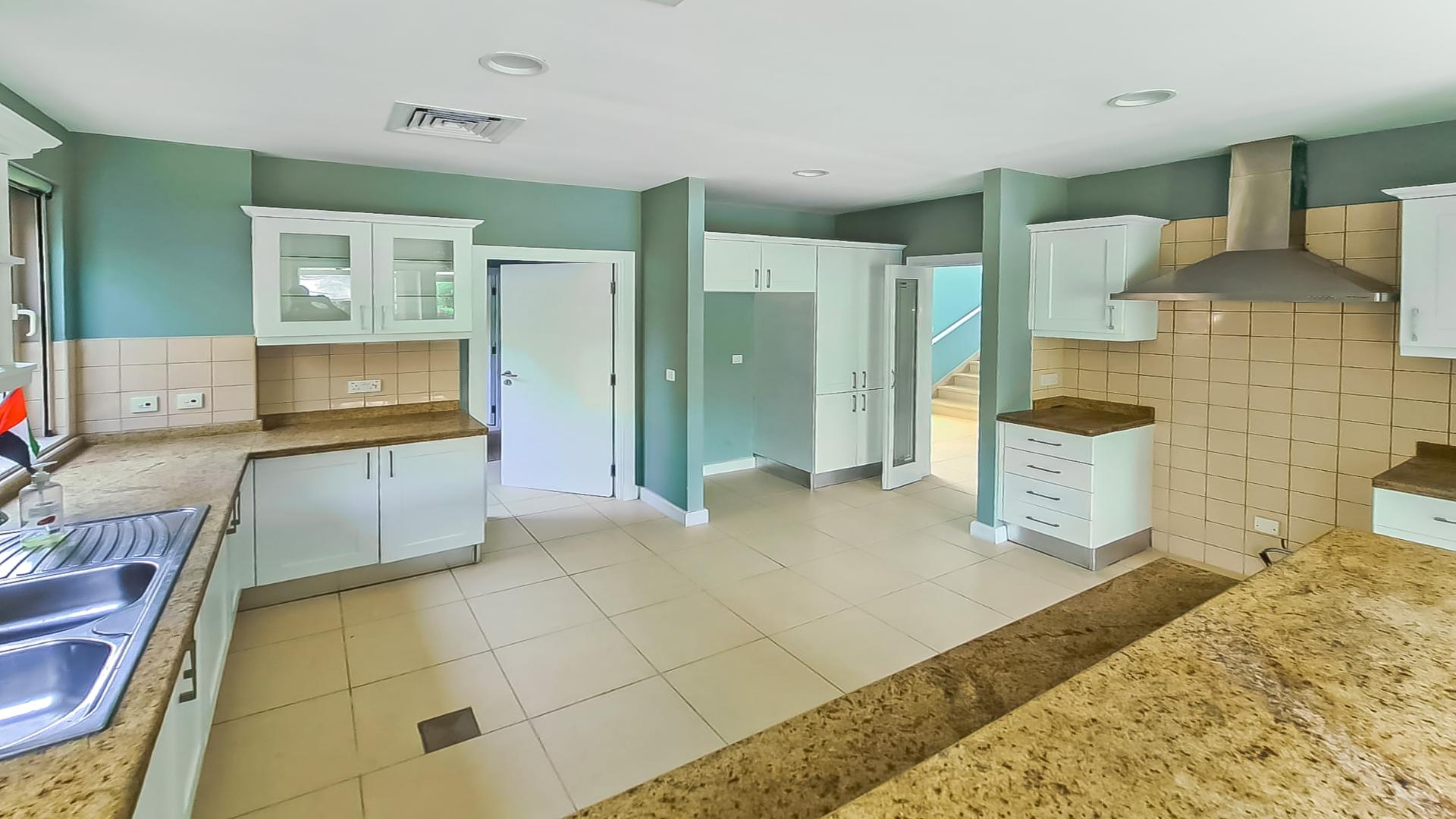 Bright living room with garden view in Saheel villa, Arabian Ranches for rent