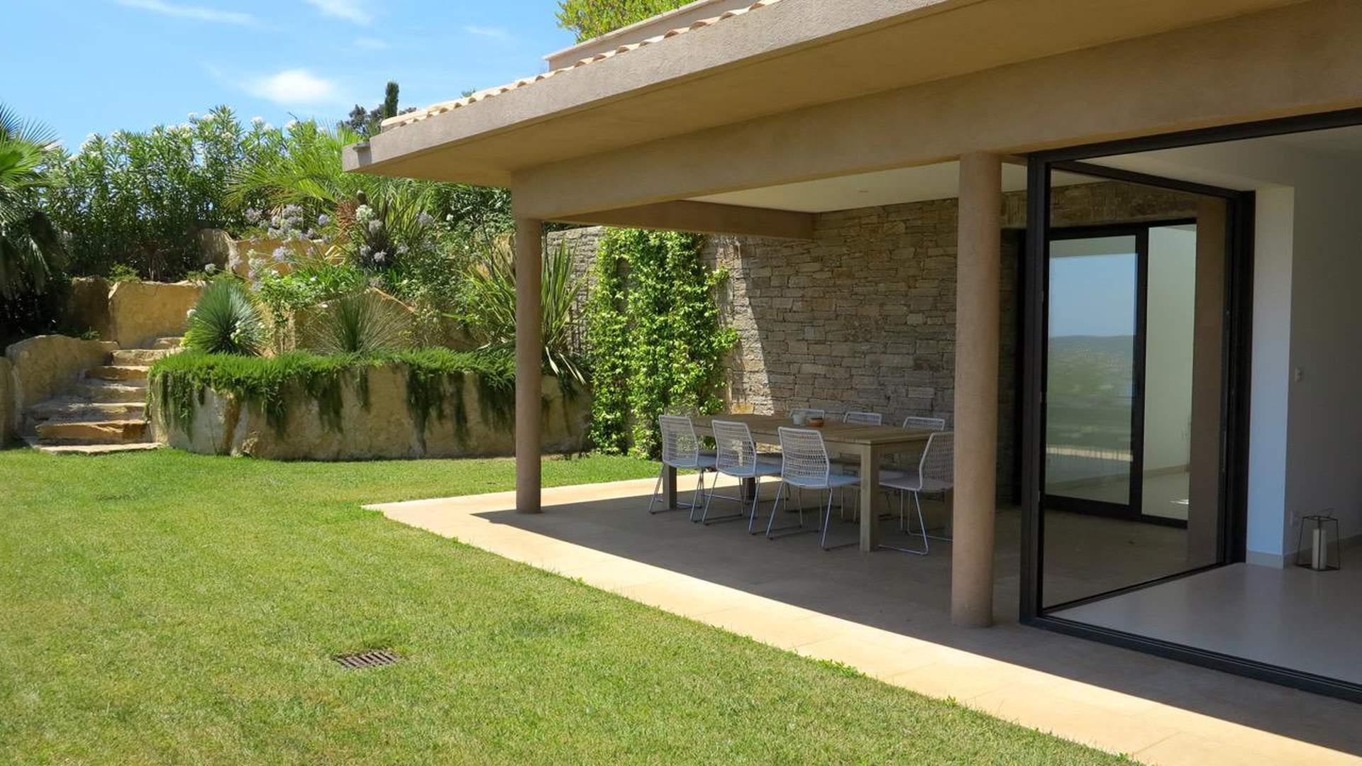 Modern kitchen with ocean view in luxury Saint-Tropez villa, French Riviera