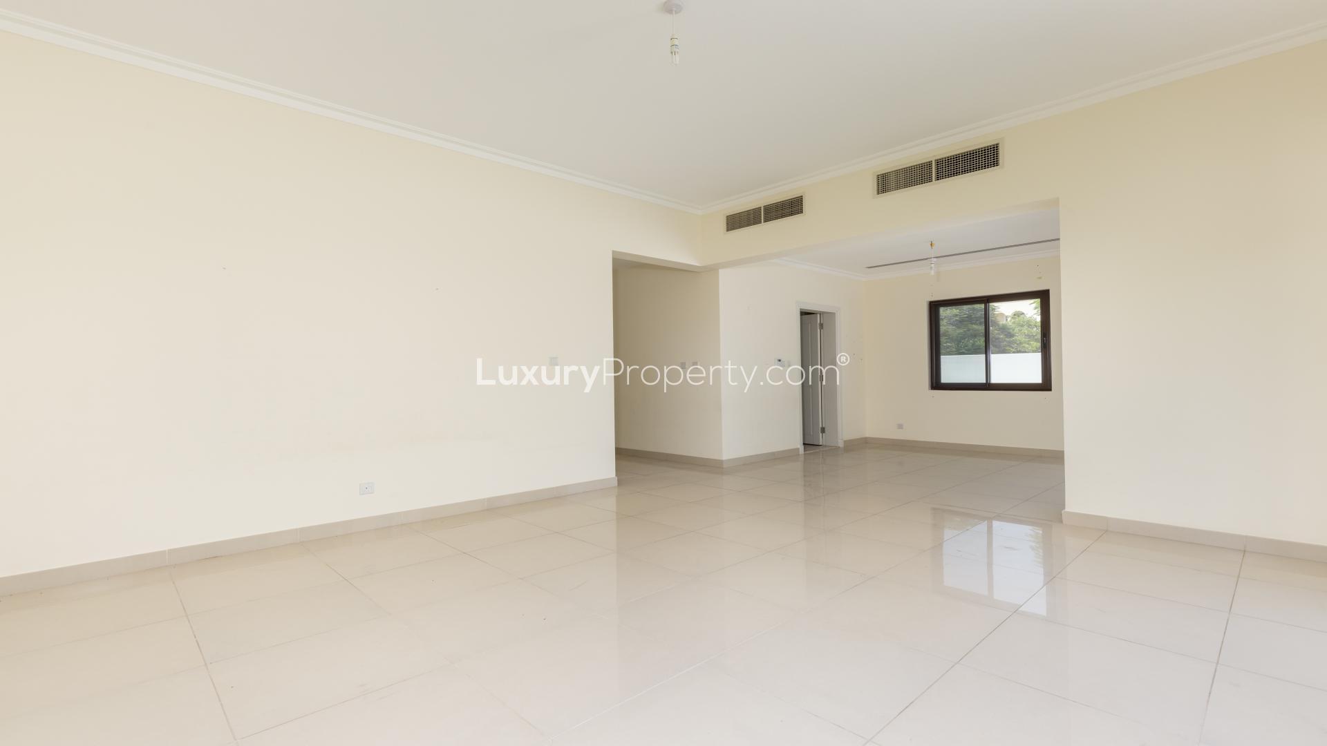 Spacious living area in Samara villa, Arabian Ranches 2, featuring tiled floors and large window