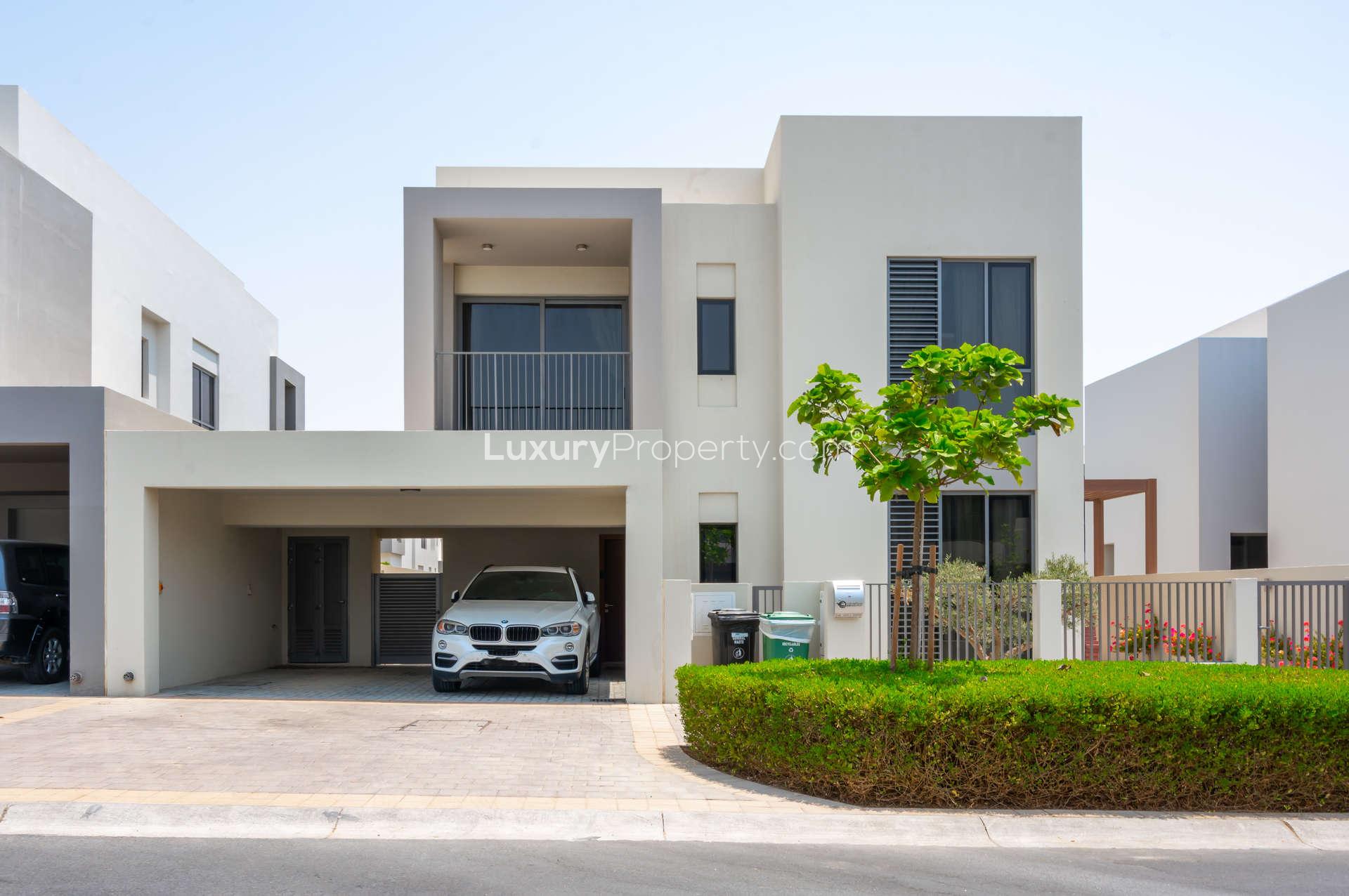Upgraded 4-bedroom villa exterior with lawn in Sidra Villas, Dubai Hills Estate