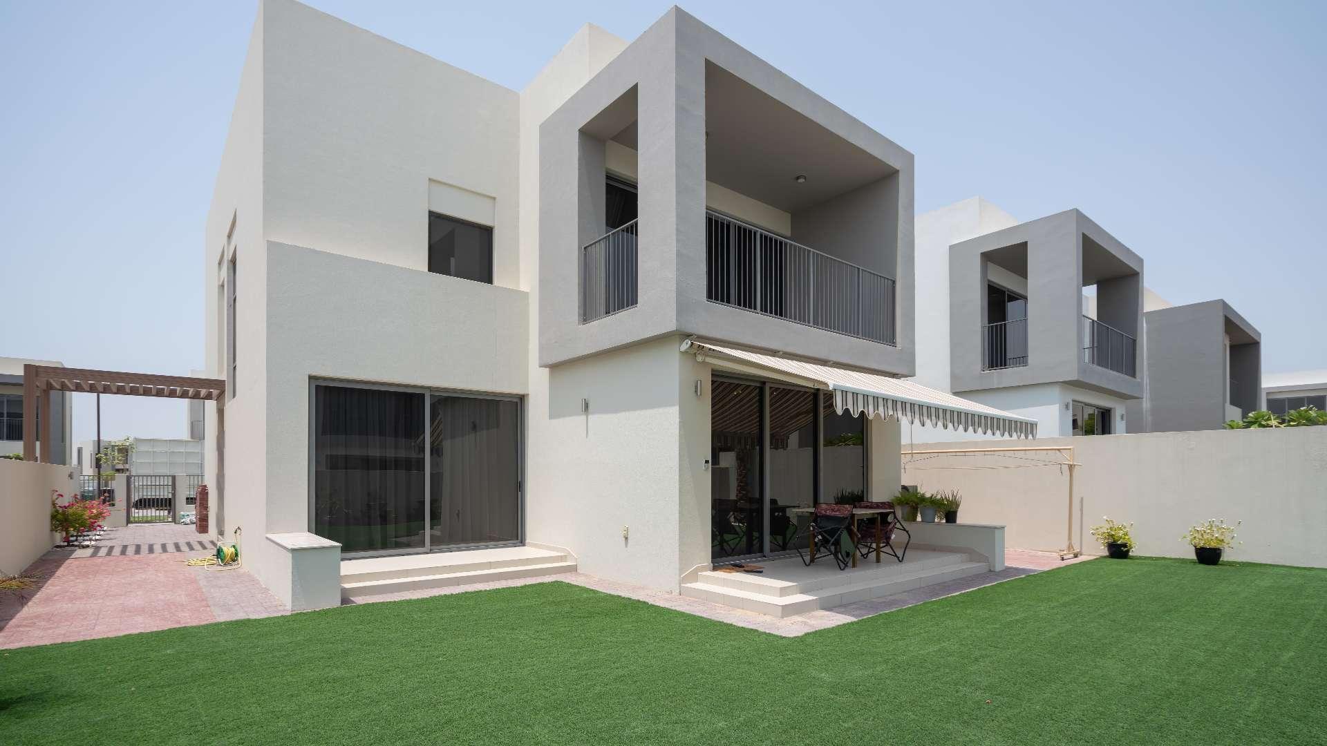 Modern kitchen and staircase in Sidra Villas 4-bedroom villa, Dubai Hills Estate
