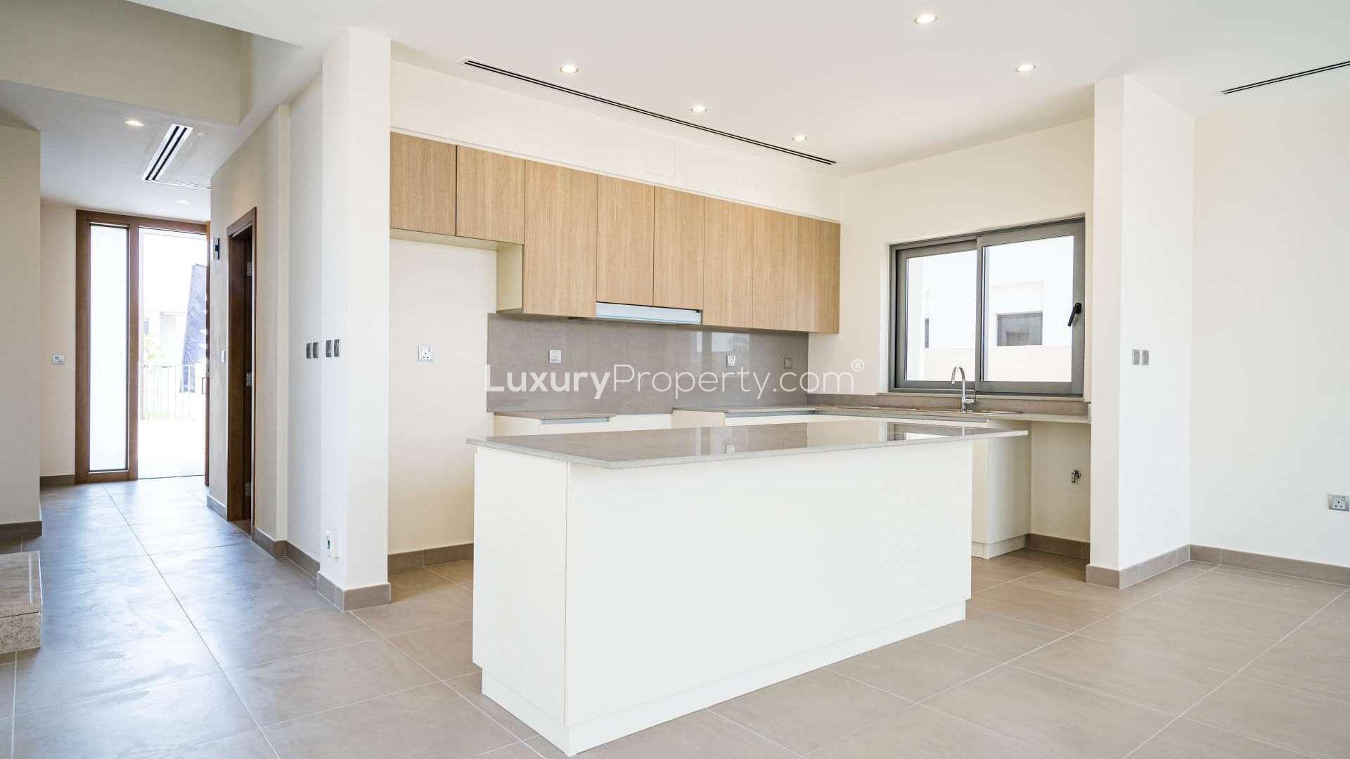 Modern villa exterior in Sidra Villas, Dubai Hills Estate, with spacious balcony and garage