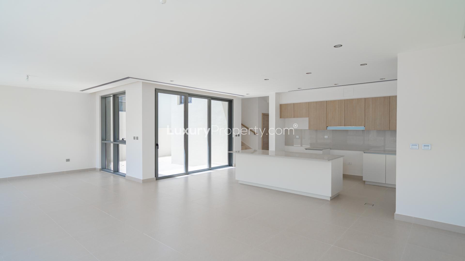 Exterior view of single-row villa with garden in Sidra Villas, Dubai Hills Estate