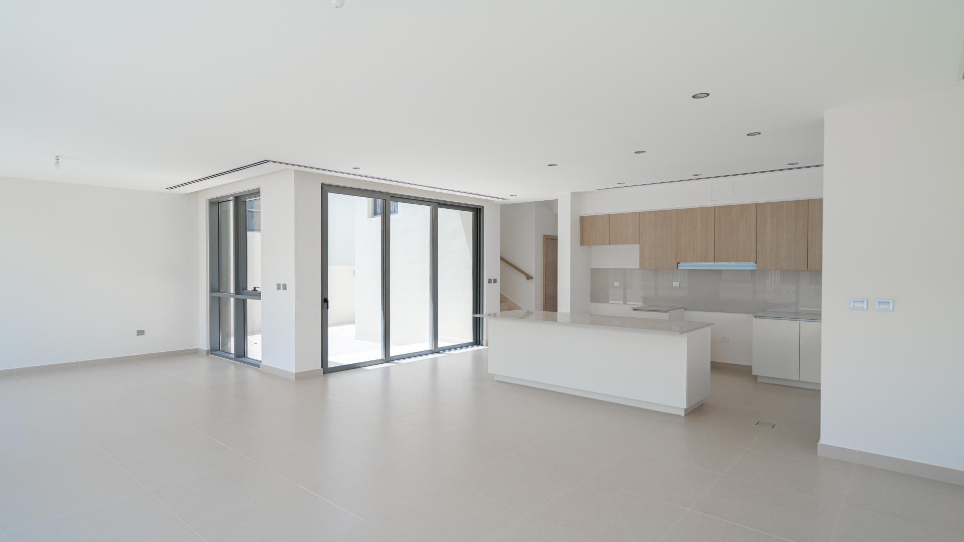 Exterior view of single-row villa with garden in Sidra Villas, Dubai Hills Estate