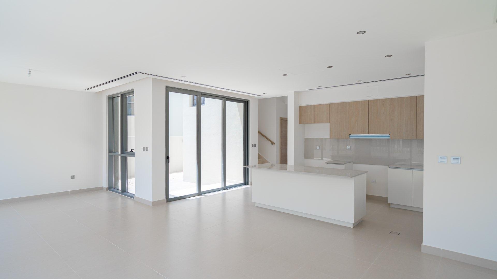 Modern kitchen and dining area in 4-bedroom villa, Sidra, Dubai Hills Estate