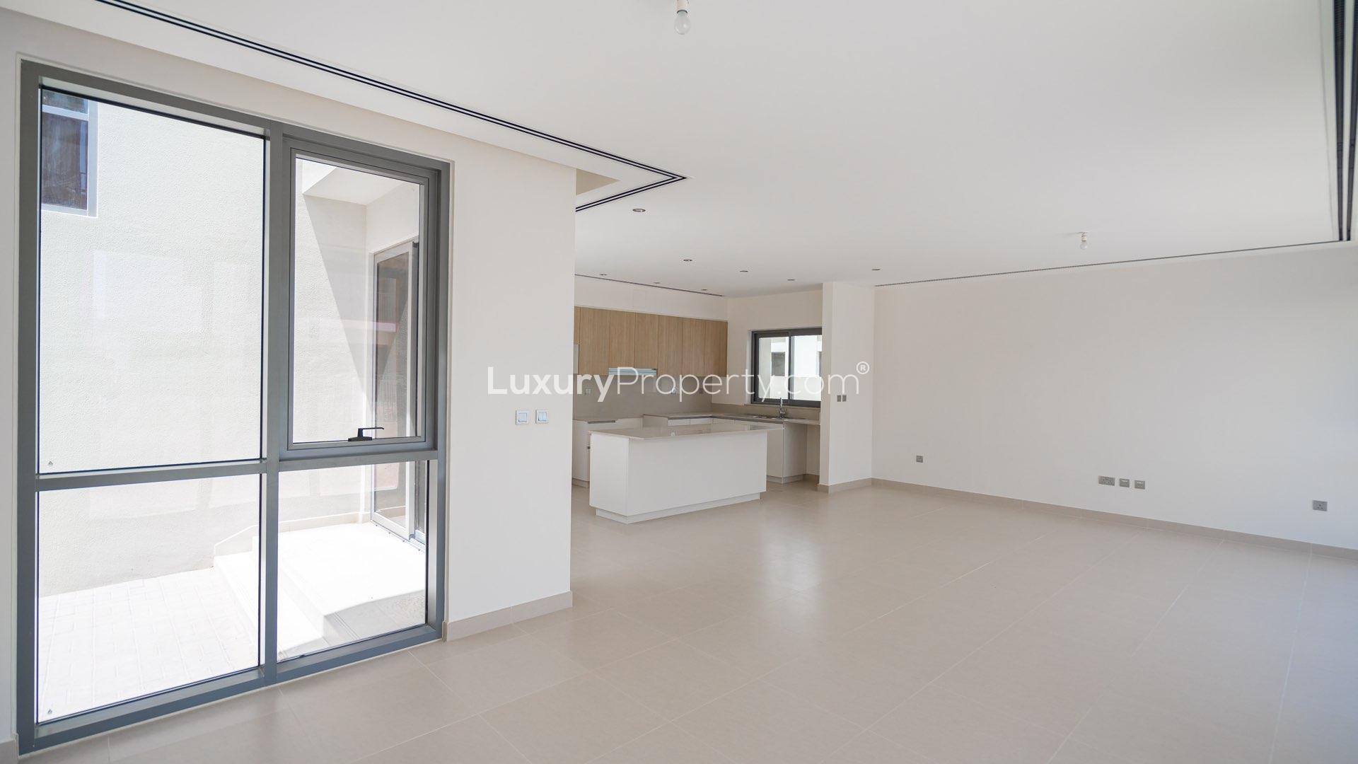 Modern kitchen and living area in 4-bedroom villa, Sidra, Dubai Hills Estate