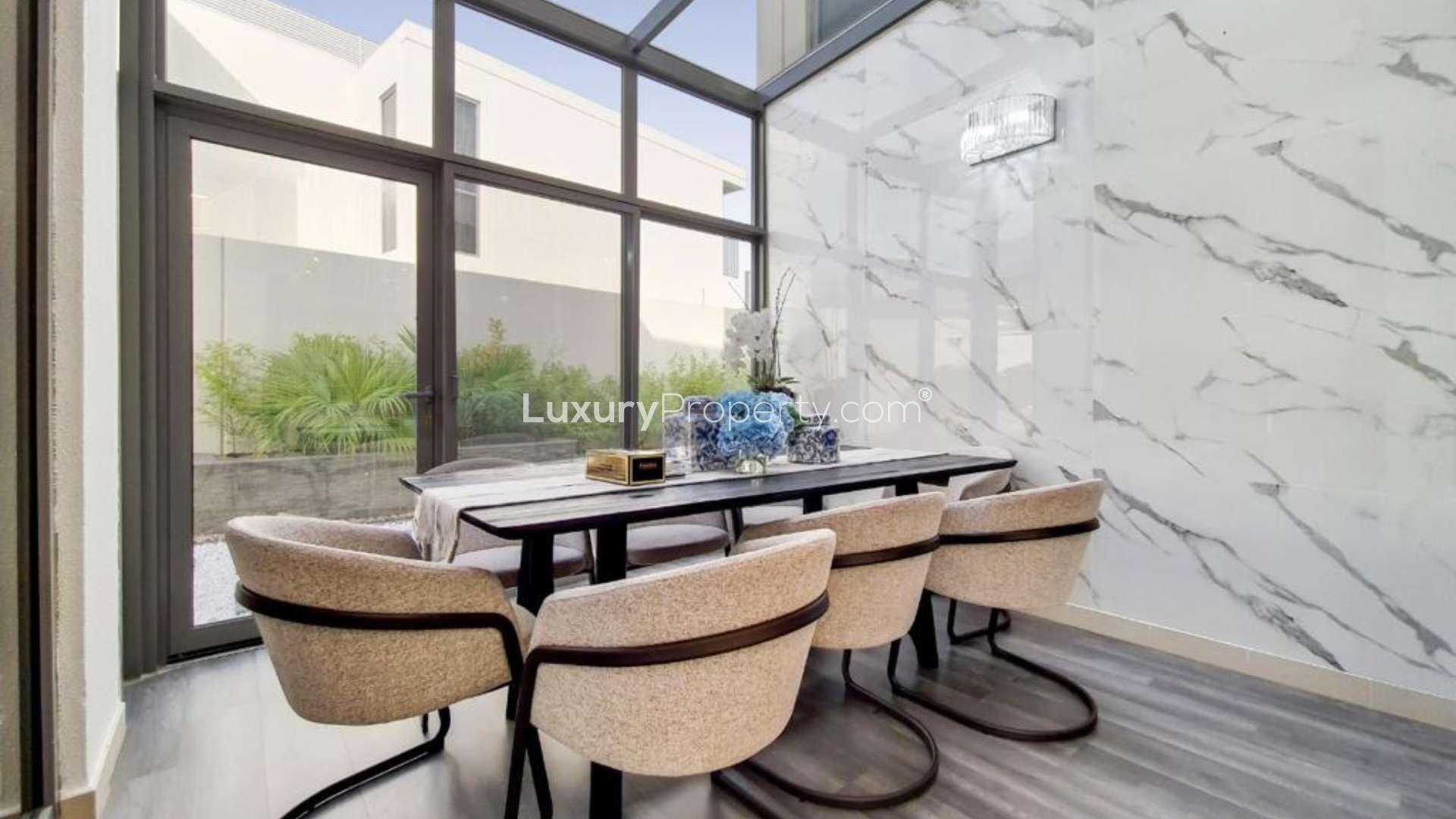 Contemporary open-plan living room and kitchen in Sidra Villas, Dubai Hills Estate