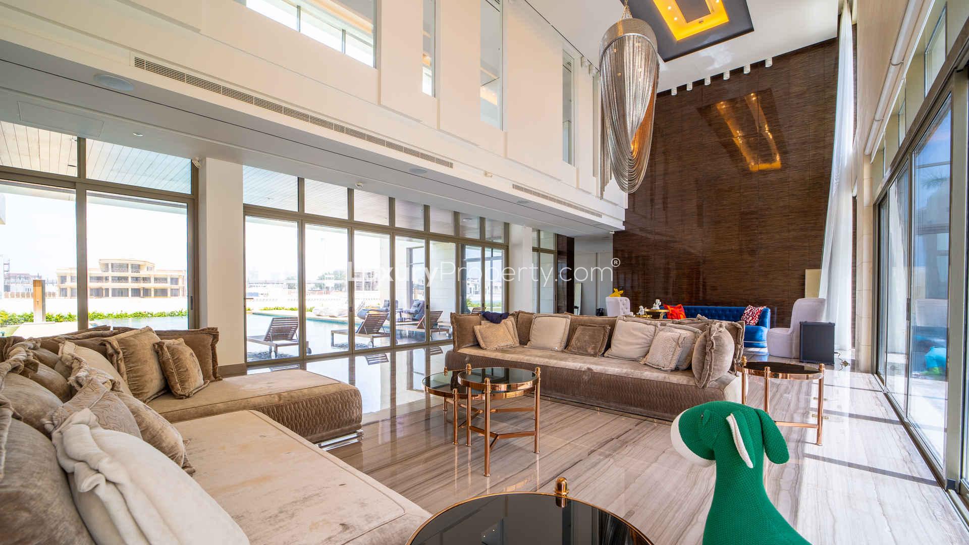 N/A,Luxurious living room in custom-built Palm Jumeirah villa, featuring elegant decor and spacious design