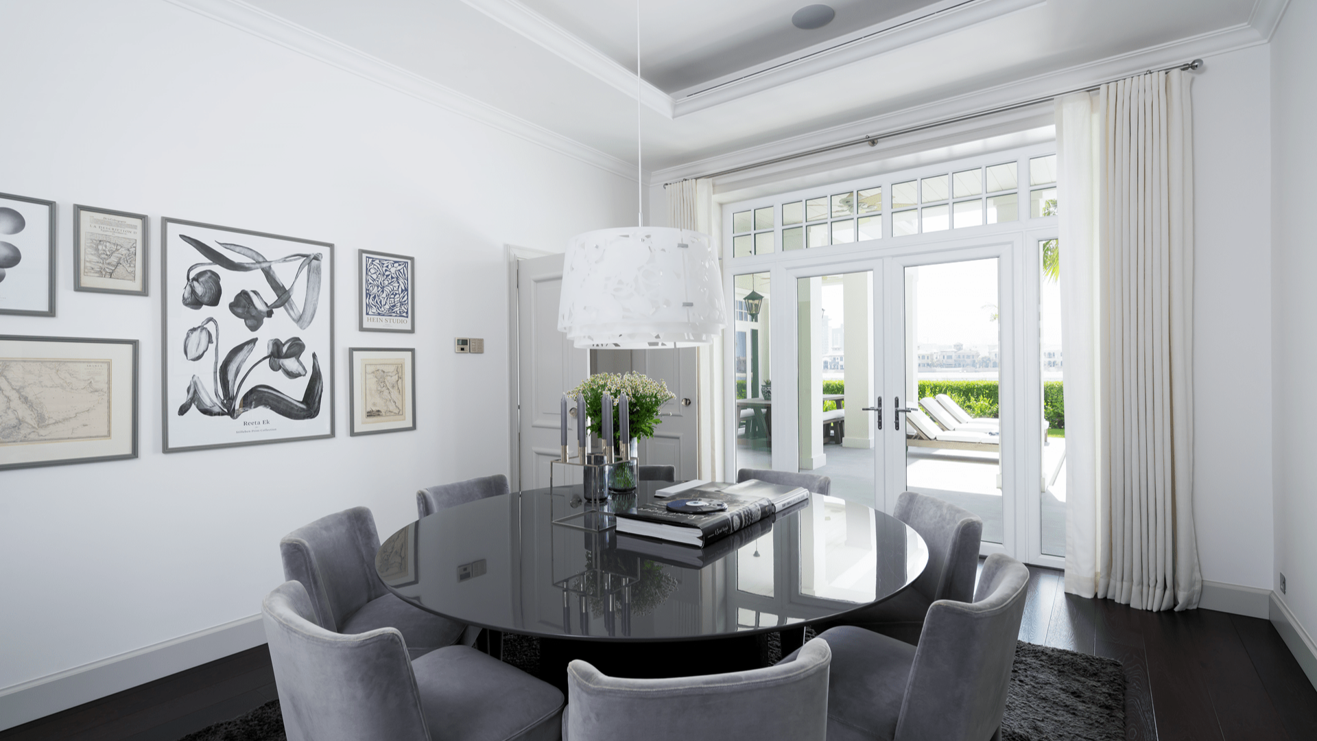 Luxurious living room in 5-bedroom villa, Palm Jumeirah, with elegant decor and garden view