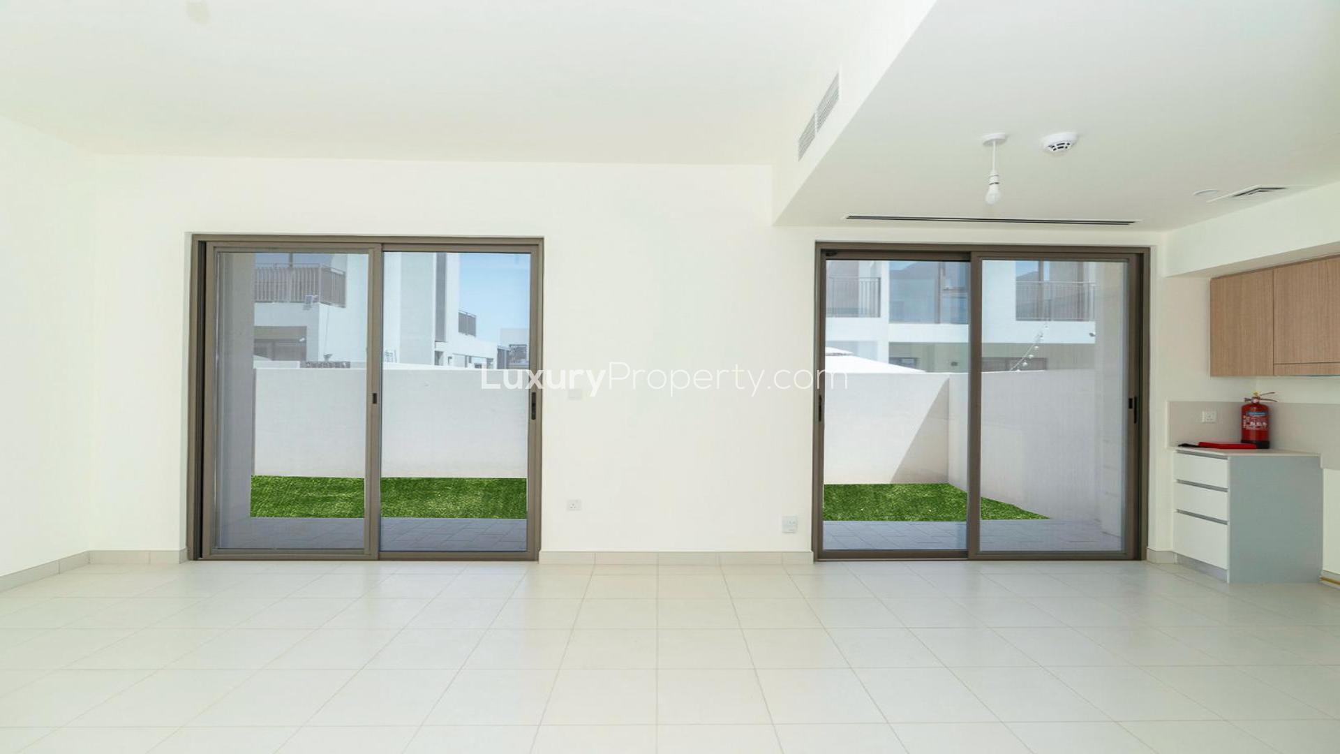 Spacious open-plan kitchen and living area in Parkside 2 villa, Emaar South, Dubai