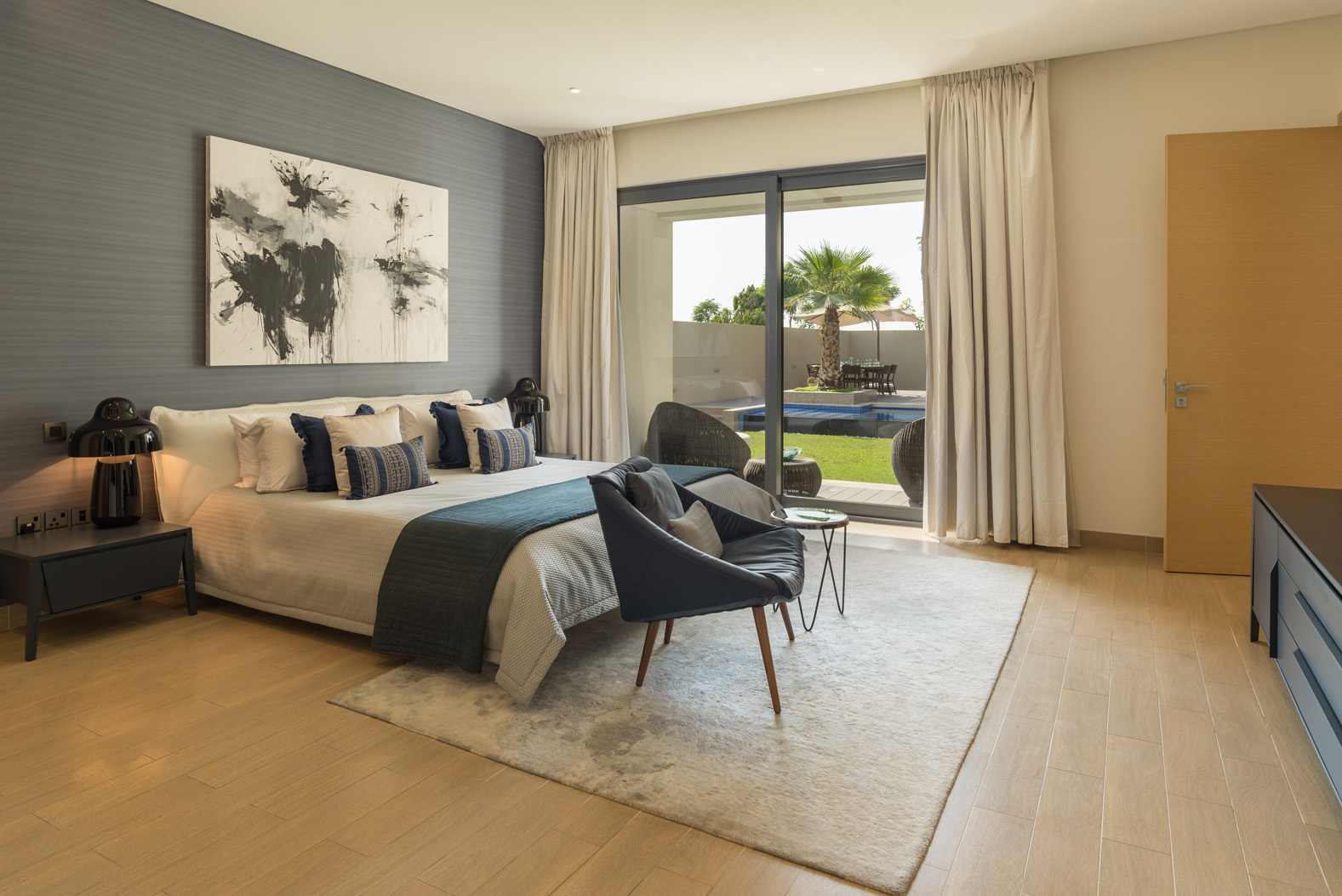 Luxurious Sobha Hartland Gardenia Villa exterior with garden and pool, Dubai Water Canal view