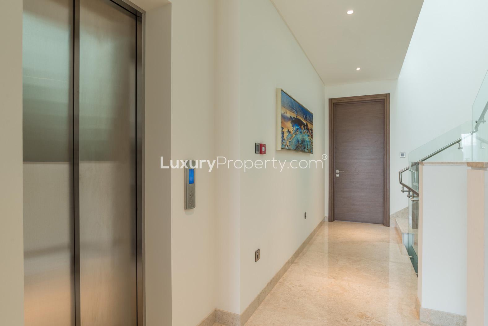 Modern bedroom interior in Sobha Hartland townhouse, MBR City, with elegant decor and view