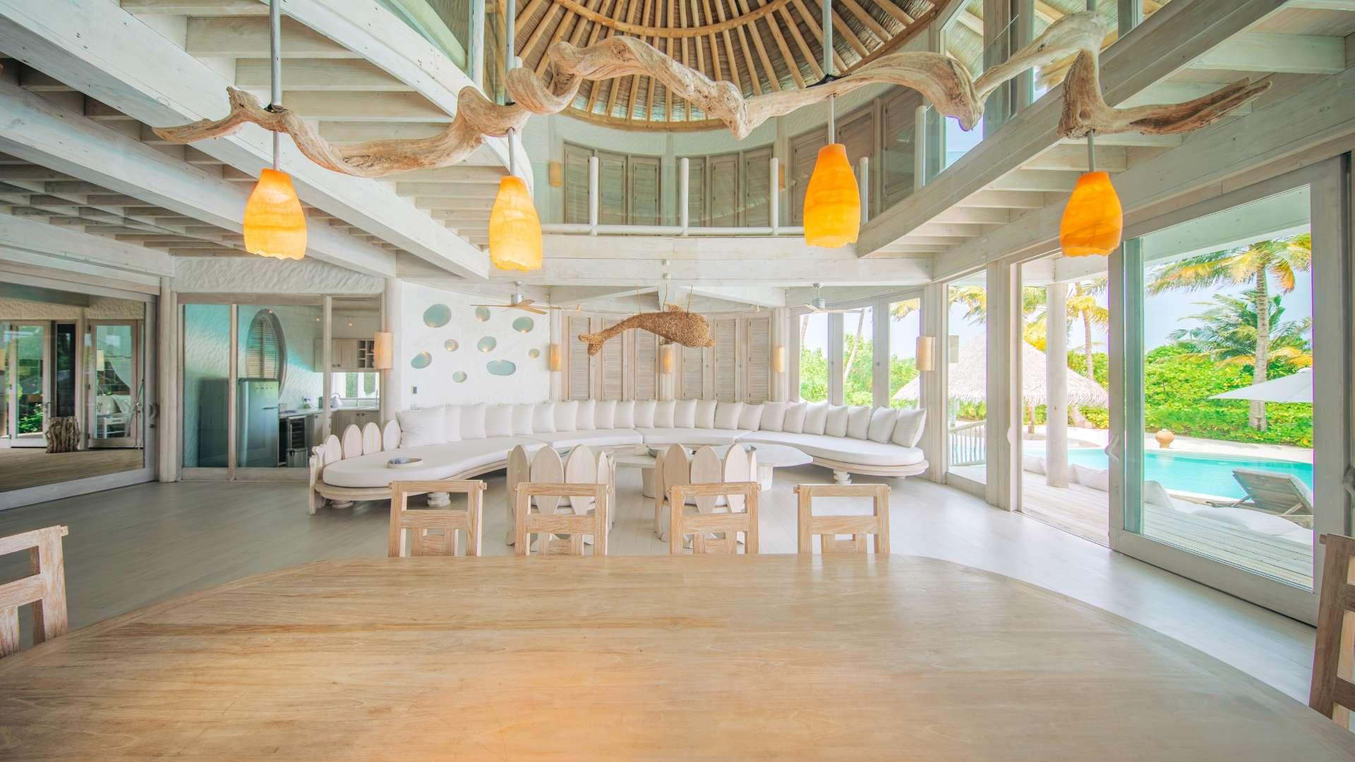 Bright, open interior of BeachFront Island Villa in Soneva Jani, Noonu Atoll