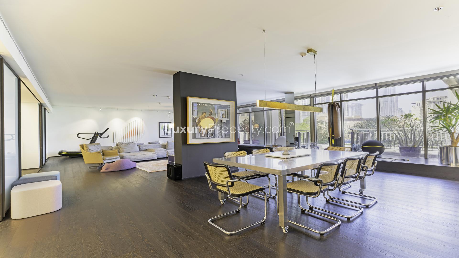 Alt text: "Balcony view of Downtown Dubai skyline from luxury villa in South Ridge community.",Luxurious living room in upgraded 6-bedroom villa, Downtown Dubai, South Ridge community