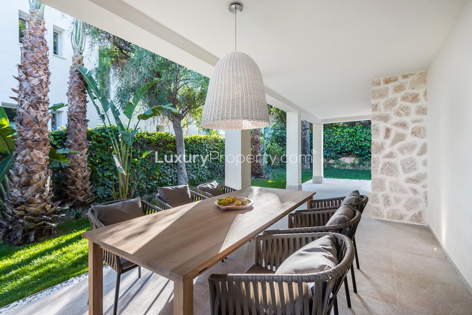 Mediterranean villa bedroom with pool view in Santa Ponsa, Mallorca, for sale