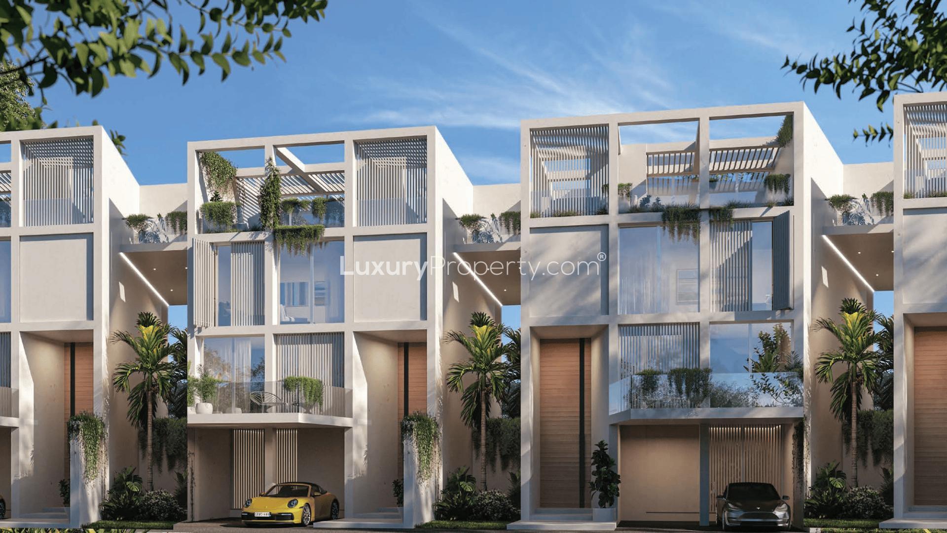 Luxurious living room with lake view in Al Barari townhouse, Ixora community